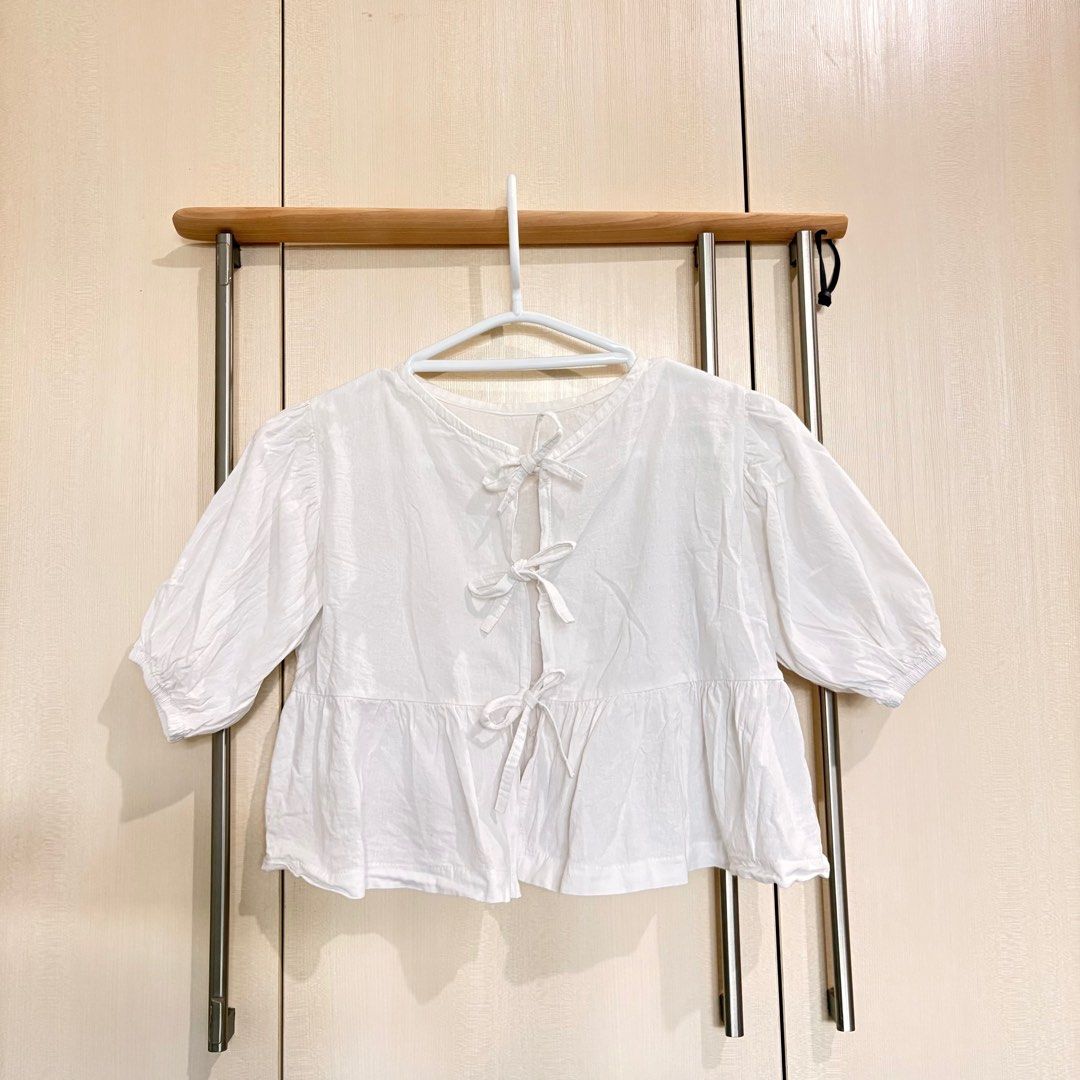 Ganni-Style Front Ribbon Linen Top (Category: Blouses) located in Makati City. Submitted by tonimoly (Listing ID 1417470470, Image 2). Description: - Linen material - Gently used - Cute top - Size Small RFS: decluttering Location: Makati.