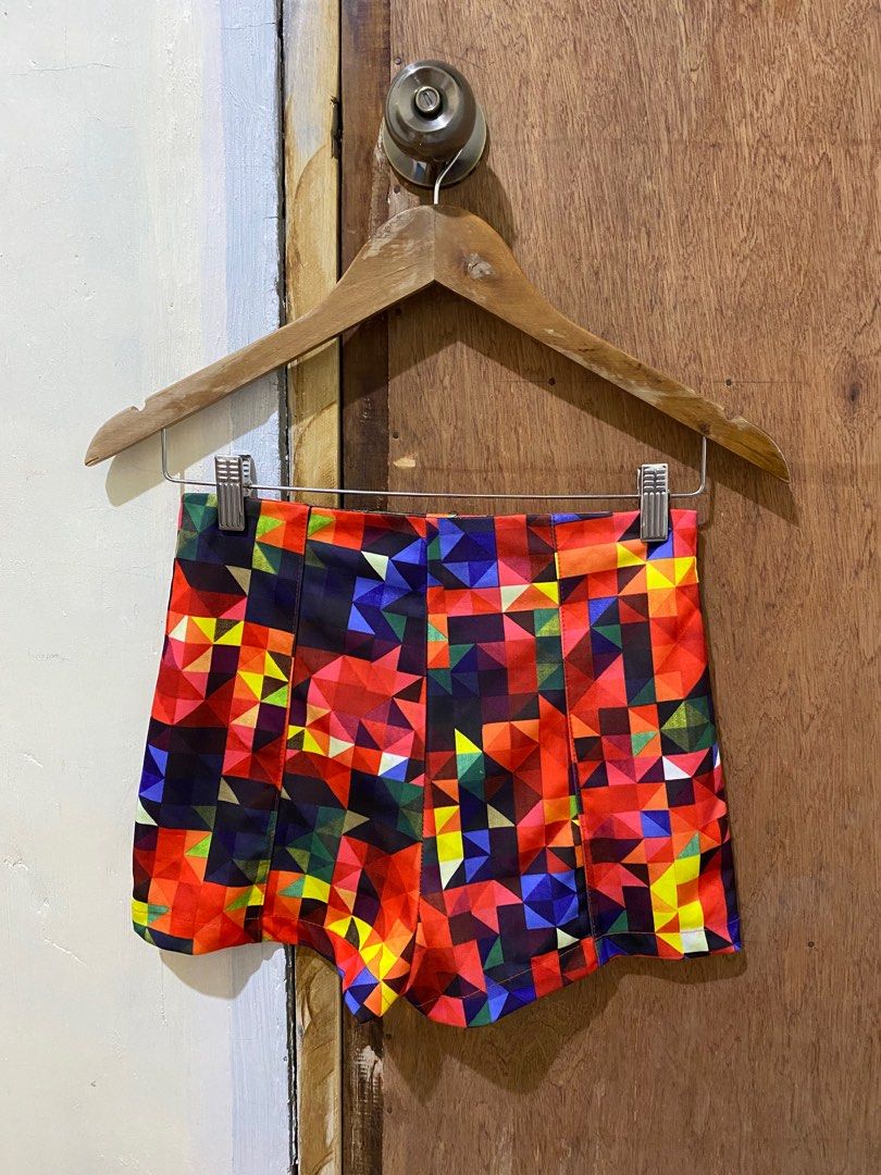 Geometric Print High-Waisted Shorts (Category: Shorts) located in Guimba. Submitted by xeeeyaaaah (Listing ID 1417498734, Image 2). Description: - Stylish high-waisted shorts - Vibrant geometric pattern - Front zipper closure - Flattering fit - Colorful design (red, orange, yellow, blue, green) - Versatile: Dress up or down.