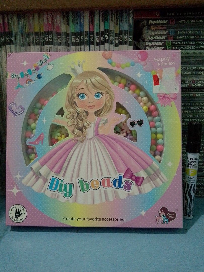 Happy Princess DIY Beads Set (Category: Craft Supplies & Tools) located in Ligao. Submitted by zeeyans_nook (Listing ID 1417440316, Image 1). Description: - Happy Princess DIY Beads set for making bracelets, necklaces, and more. - Includes colorful beads. - Suitable for kids aged 3 years and up. - Features a princess-themed box. - Contains everything needed to start crafting..