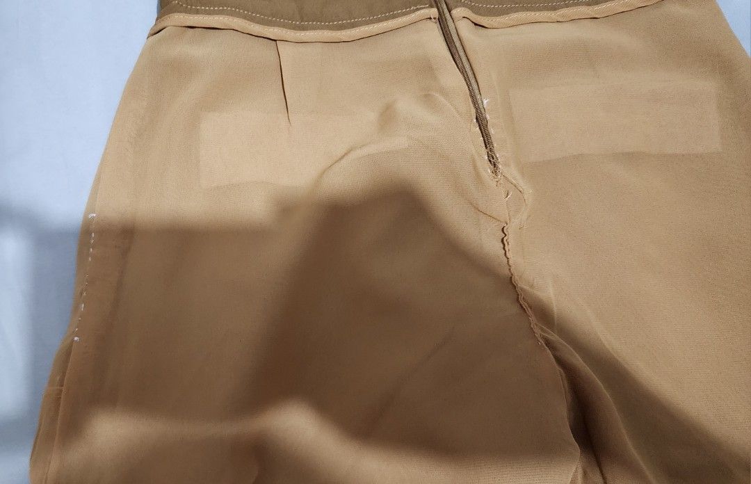 High-Waisted Shorts with Button Detail (Category: Shorts) located in Imus. Submitted by sashafame (Listing ID 1417548886, Image 3). Description: - High-waisted design - Button details - Back zipper closure - Solid brown color - Lightweight fabric - Wide leg opening - Ideal for warm weather - with flaws on inside.