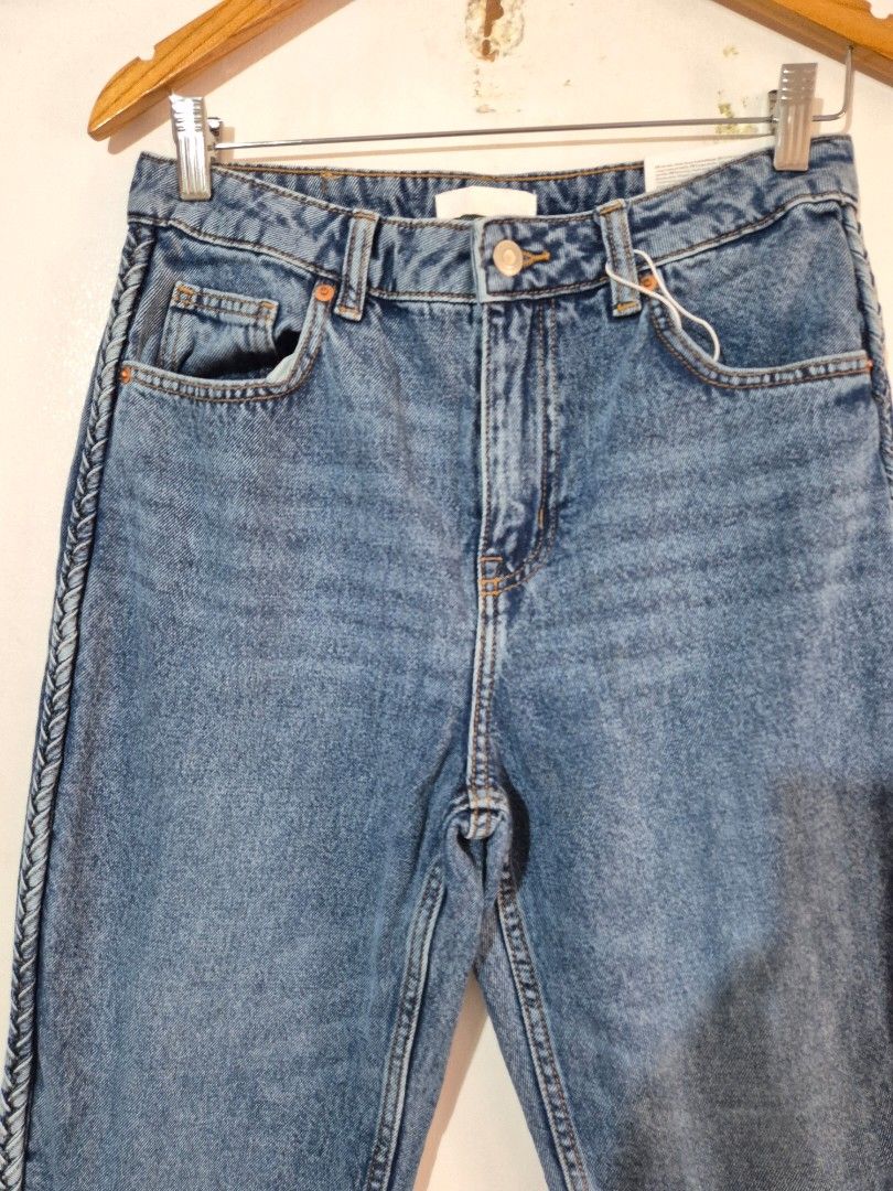 H&M Divided Straight High Waist Jeans (Category: Jeans) located in Caloocan City. Submitted by clevercloud.e1971a (Listing ID 1417461402, Image 2). Description: - H&M Divided jeans - Straight leg, high-waisted - Light blue wash - Decorative stitching on side seams - Front and back pockets - Button and zipper closure - Includes brand tag sz 28 30 34 38 waist available.