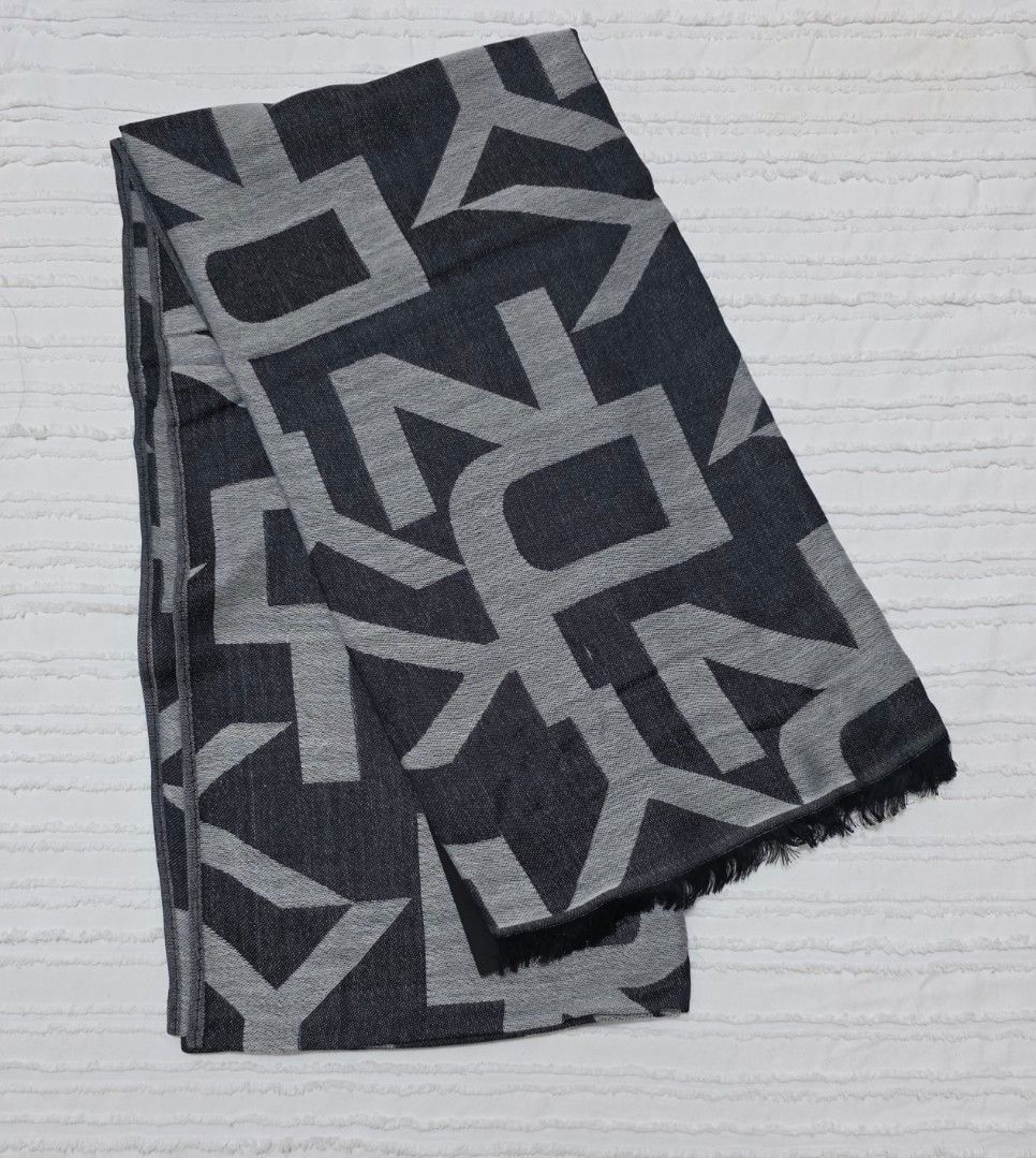 DKNY Jacquard Logo Woven Scarf (Category: Scarves) located in Taguig. Submitted by iamloulouvi (Listing ID 1417597047, Image 1). Description: - Price is firm - This is a thin scarf made of 55% viscose (premium material) and 45% polyester, suitable for spring/fall. Also good for Ph weather during the cooler months. Not suitable for winter in temperare climates (those scarves are typically made of acrylic, wool, cashmere, mohair mixed with polyeste