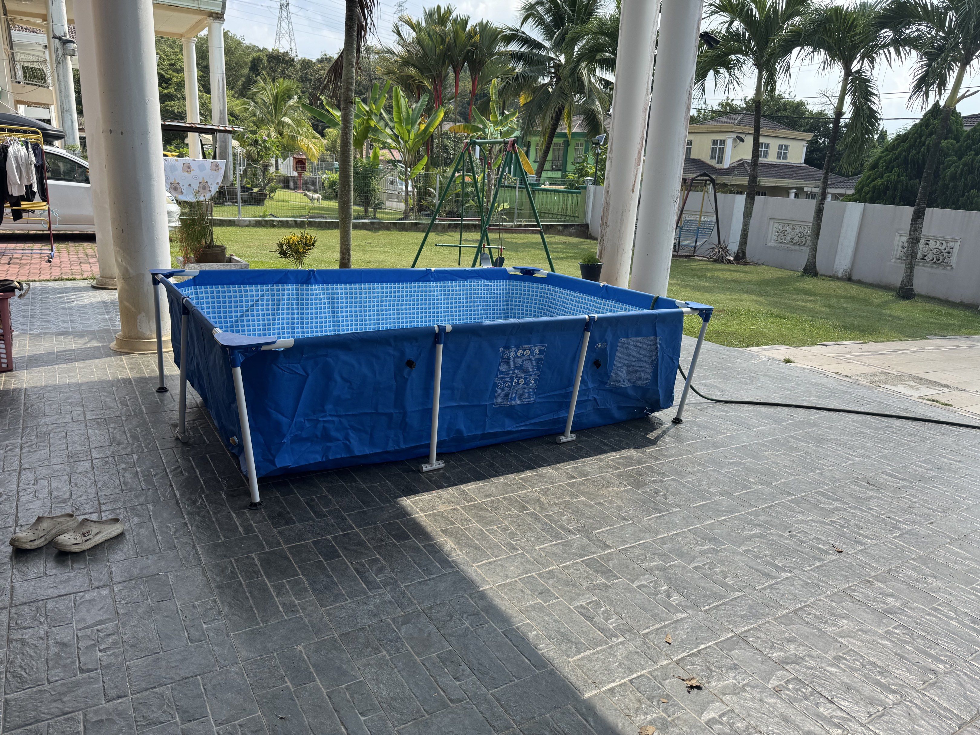 Intex Rectangular Frame Pool (Category: Other Sports Equipment and Supplies) located in Serendah. Submitted by tanchengwui (Listing ID 1417557139, Image 3). Description: Condition: Used – small hole (can be patched) Status: Still usable after patching / DIY repair Size: 📏 300 × 200 × 75 cm (still got box) Details: • Strong metal frame • Thick Intex liner • Suitable for kids & adults • Used at covered porch area • Selling because no longer in use