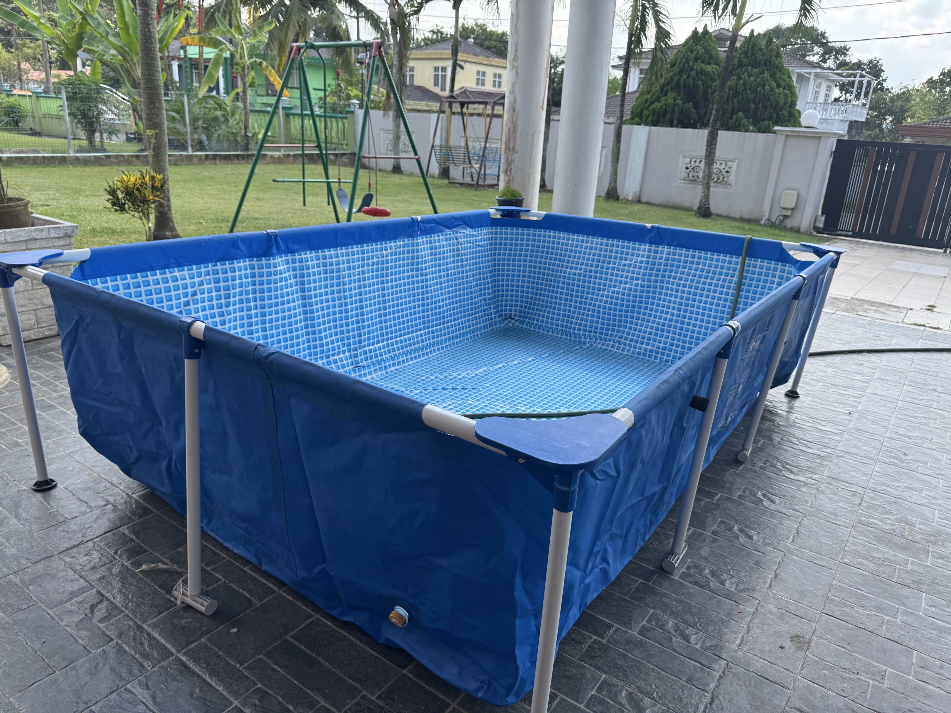 Intex Rectangular Frame Pool (Category: Other Sports Equipment and Supplies) located in Serendah. Submitted by tanchengwui (Listing ID 1417557139, Image 1). Description: Condition: Used – small hole (can be patched) Status: Still usable after patching / DIY repair Size: 📏 300 × 200 × 75 cm (still got box) Details: • Strong metal frame • Thick Intex liner • Suitable for kids & adults • Used at covered porch area • Selling because no longer in use