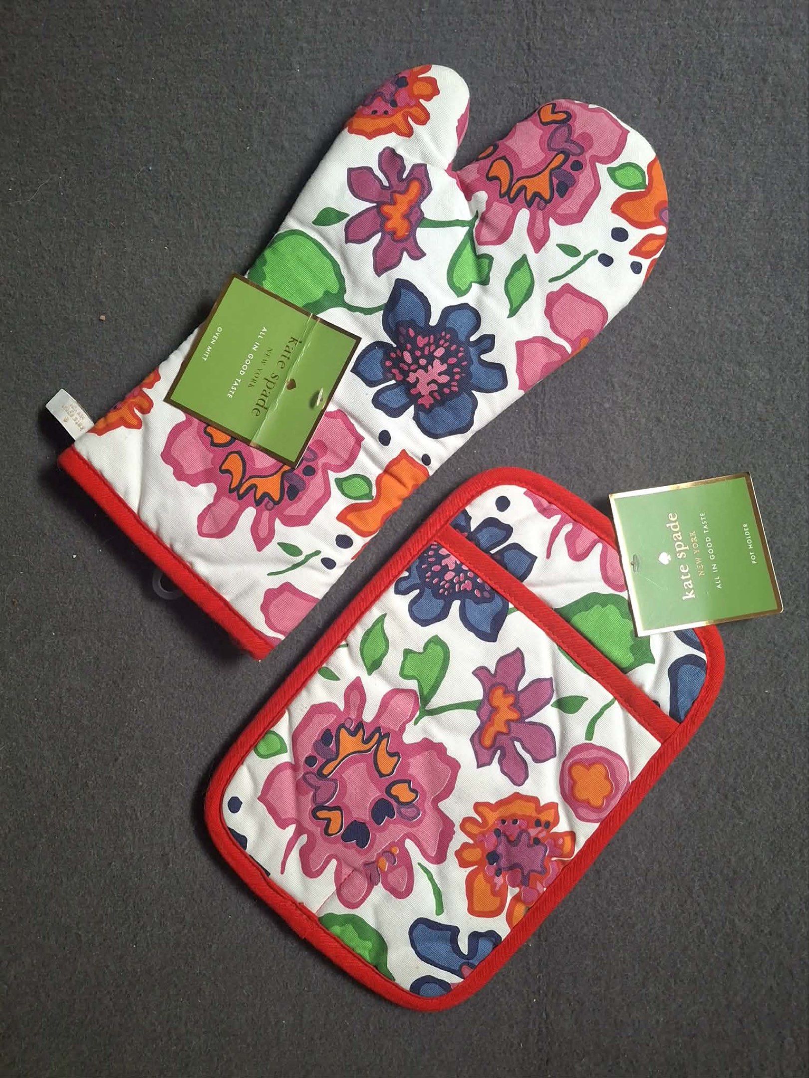 Kate Spade Oven Mitt and Pot Holder Set (Category: Cookware & Accessories) located in Makati City. Submitted by sweetsj (Listing ID 1417544618, Image 2). Description: - Floral Set Set includes a floral oven mitt, a matching pot holder, and a green oven mitt. Set Price: 1,200 -Green oven mitt has the words "ALL IN GOOD TASTE" printed on it. Price: 700 Take all Price: 1800 All items have a Kate Spade tag..