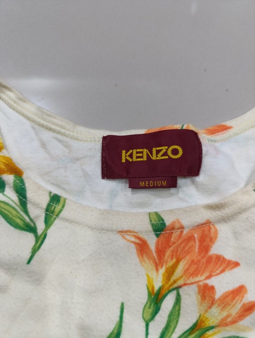 Kenzo Floral Long Sleeve Top - Medium (Category: Luxury Apparel) located in Davao. Submitted by idioticthrifter (Listing ID 1417556168, Image 2). Description: - Kenzo long sleeve top - Features a vibrant floral print - Round neckline - Size: Medium - Made in Japan - Lightweight fabric - Colors: Orange and yellow flowers on a cream background -issues: minimal lints and need wash - dimension: 22.5 x 25.