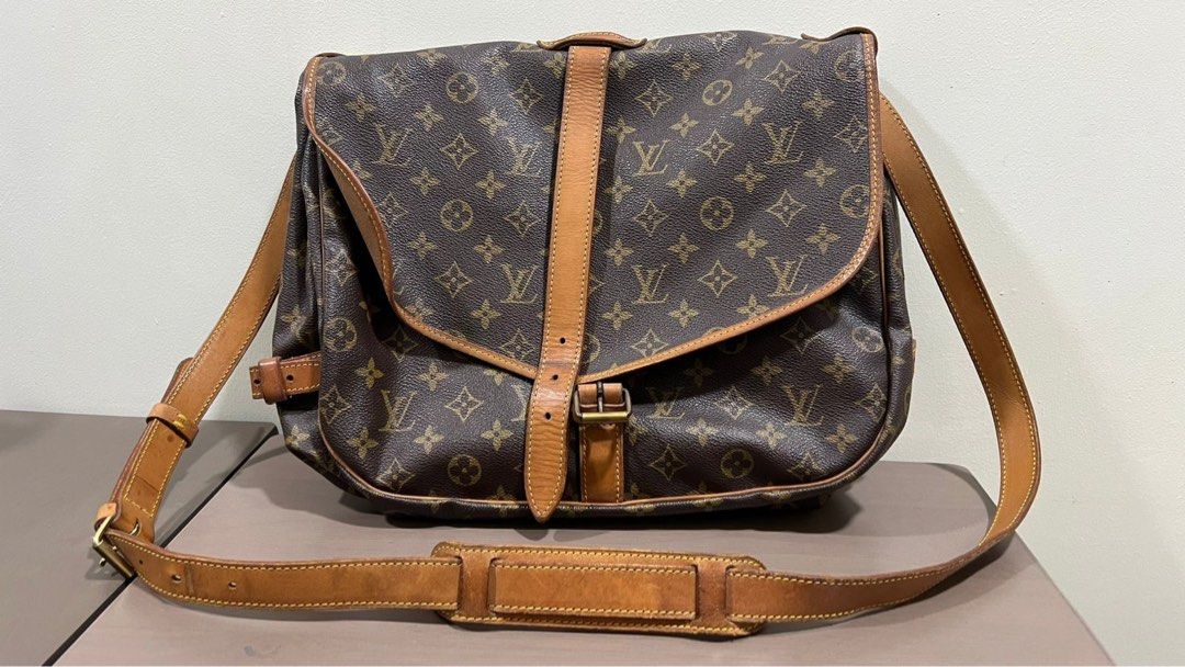 Louis Vuitton - Saumur (Category: Luxury Bags & Wallets) located in Mandaluyong City. Submitted by kiko0304 (Listing ID 1417599413, Image 1). Description: Style: Louis Vuitton - Saumur Condition: PreOwned Place and Year Bought: Bought from a friend, 2023 Price Bought: Php 42k Selling Price: Php 22k Others: no other inclusions Reason for Selling: switched to bigger bags since it wont fit my 15inch laptop.