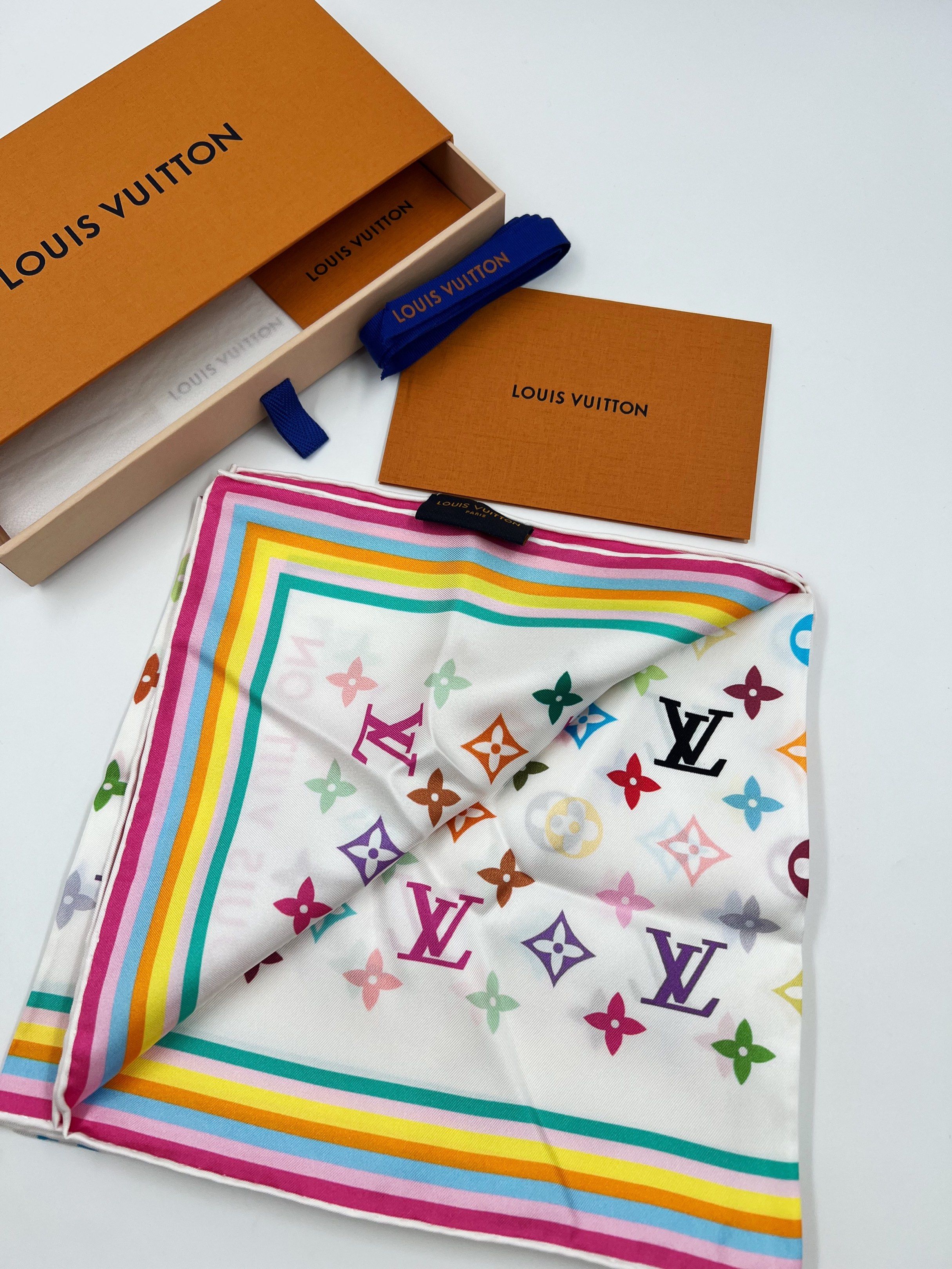 ⚜️LV x Murakami Scarf (Category: Luxury Accessories) located in Makati City. Submitted by 90sangel (Listing ID 1417457620, Image 3). Description: pure silk LV x TM scarf. 🌈🌻🐝 sale, no restock! Hard to find 90cm 🫧 Printed with Murakami’s vibrant Multicolor version of the Maison’s emblematic motifs, this versatile piece can be styled in many fashionable ways: as a hair accessory, knotted at the neck, at the waist, or on the handles of a bag. •S
