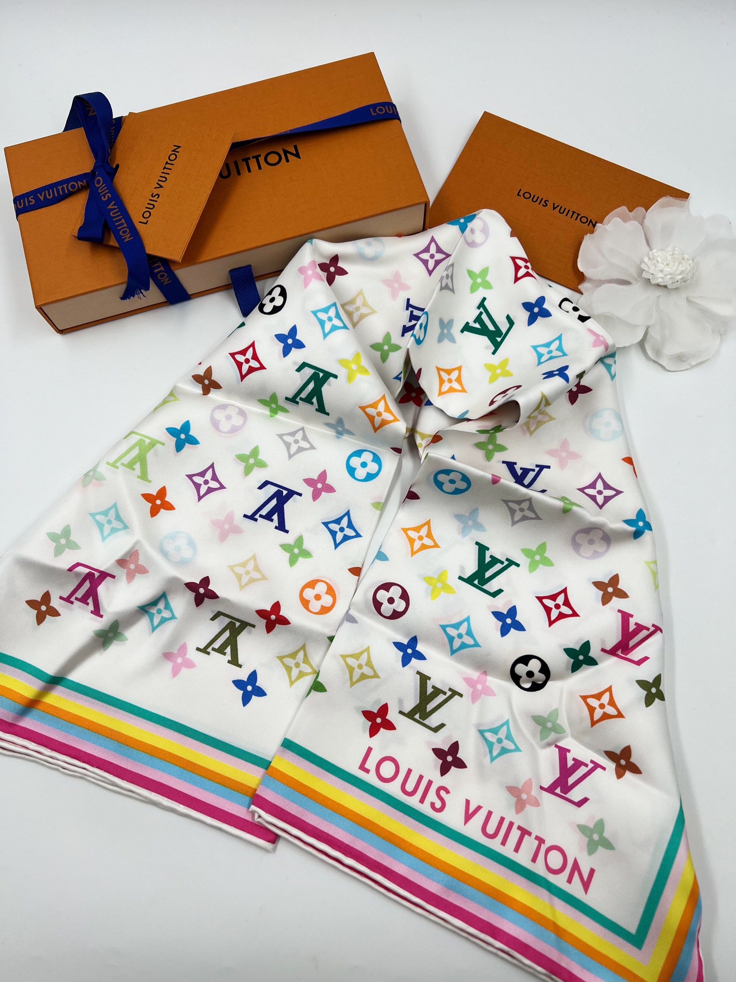 ⚜️LV x Murakami Scarf (Category: Luxury Accessories) located in Makati City. Submitted by 90sangel (Listing ID 1417457620, Image 2). Description: pure silk LV x TM scarf. 🌈🌻🐝 sale, no restock! Hard to find 90cm 🫧 Printed with Murakami’s vibrant Multicolor version of the Maison’s emblematic motifs, this versatile piece can be styled in many fashionable ways: as a hair accessory, knotted at the neck, at the waist, or on the handles of a bag. •S