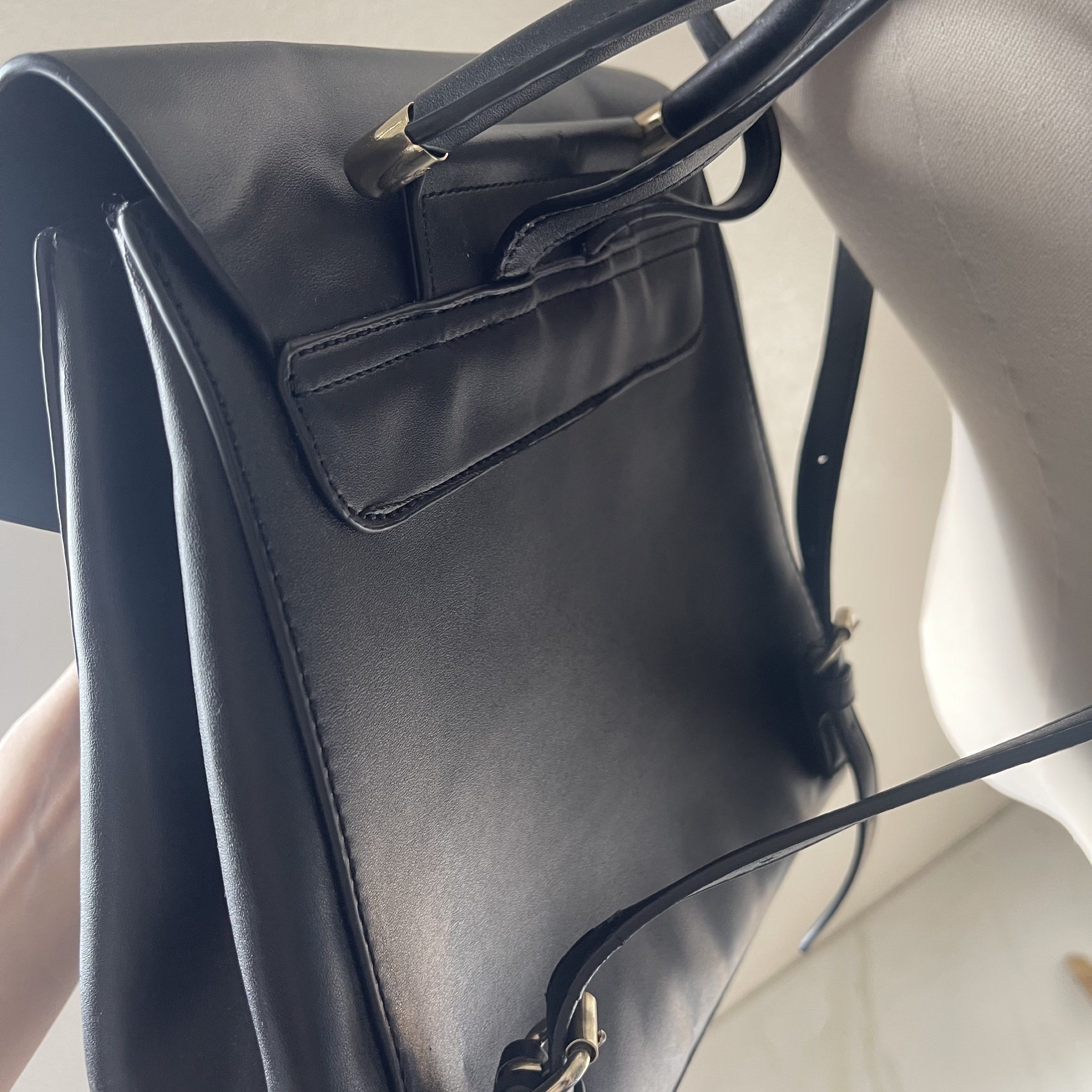 Mango Black Backpack (Category: Backpacks) located in Norzagaray. Submitted by rss13 (Listing ID 1417471955, Image 3). Description: - Black Mango backpack - Flap closure - Top handle - Adjustable shoulder straps - Interior pocket - Made of smooth, leather-like material - Mango brand visible inside.
