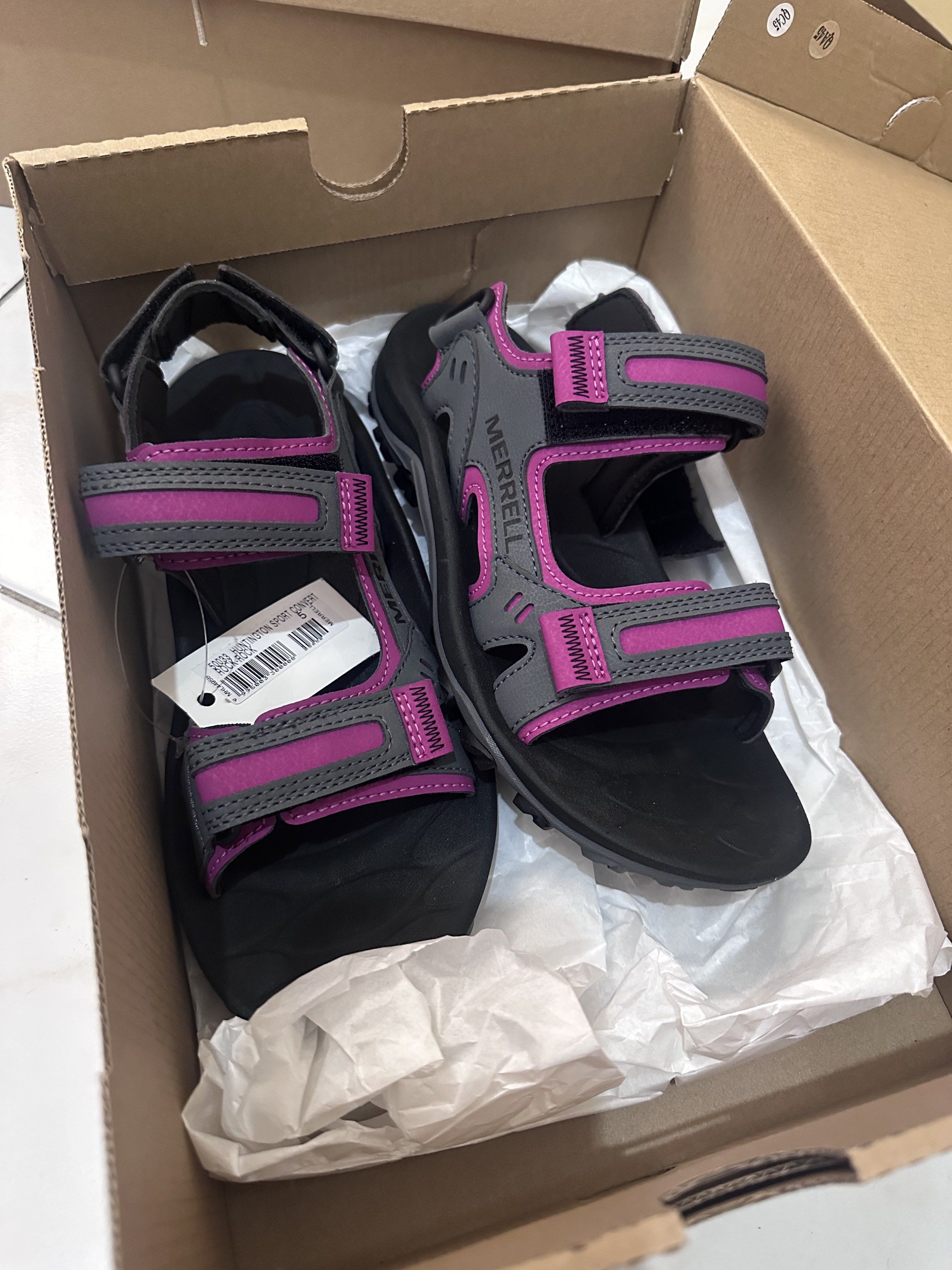 Merrell Junction Right Strap Sandals (Category: Sandals) located in Makati City. Submitted by monicacharisma2788 (Listing ID 1417448924, Image 2). Description: - Merrell Junction Right Strap sandals - Color: Black and Purple - Condition: New, with original box - Features: Adjustable straps for a secure fit - Sole: Durable, suitable for outdoor activities.