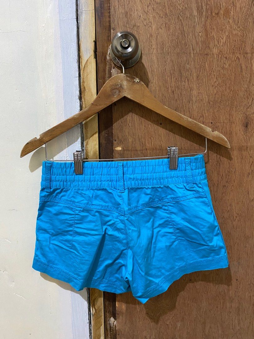 Nike Blue Shorts (Category: Shorts) located in Guimba. Submitted by xeeeyaaaah (Listing ID 1417498863, Image 2). Description: - Nike blue shorts - Drawstring waist - Two front pockets with zippers - Nike logo on front - Button closure - Comfortable fit - Perfect for casual wear or light activities -with stains.