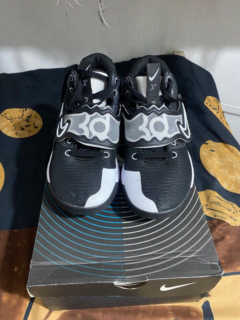 Nike KD Trey 5 X Black/White-Volt (Category: Sneakers) located in Caloocan City. Submitted by dprshaq (Listing ID 1417567400, Image 2). Description: - Nike KD Trey 5 X basketball shoes - Color: Black, White, Volt - Features: Lace strap with KD branding - Size: US 10, UK 9, EUR 44, CM 28 - Includes original box - Retail price on box: $135.00 bought in canada used twice.