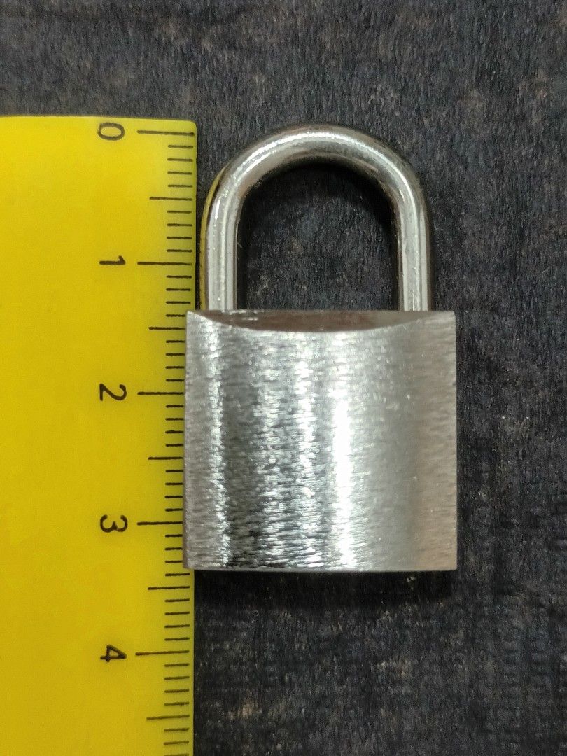 Padlock with Keys (Category: Locks, Doors & Gates) located in Manila. Submitted by m_brian (Listing ID 1417556437, Image 2). Description: - Stainless steel - Two keys.