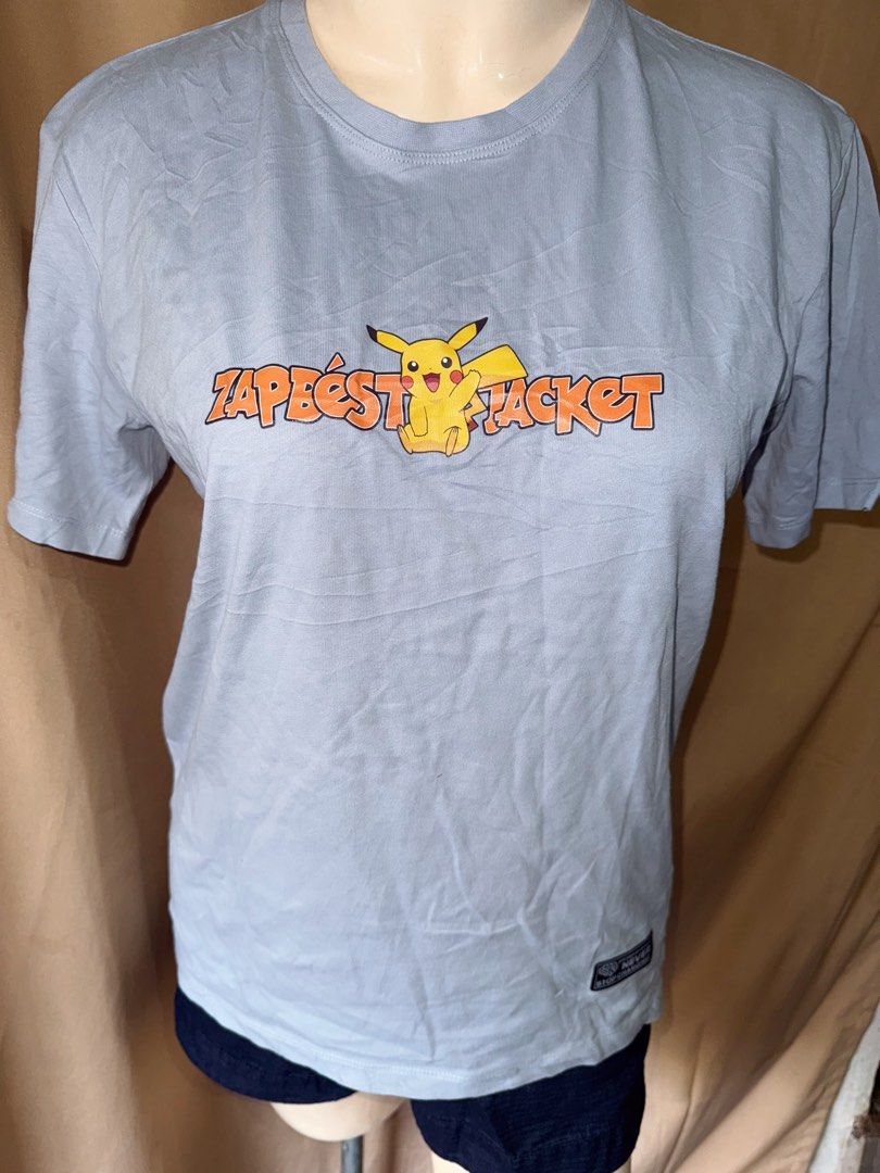 Pikachu Zap Best Jacket T-shirt (Category: Tshirts & Polo Shirts ) located in Taguig. Submitted by maliascollection (Listing ID 1417523319, Image 3). Description: -Length: 24” -Bust: 37” - Small-medium -100% COTTON - Light blue Pikachu t-shirt - Front: "Zap Best Jacket" design with Pikachu graphic - Back: Large Pikachu graphic with "Pikachu" text - Short sleeves - Crew neck.