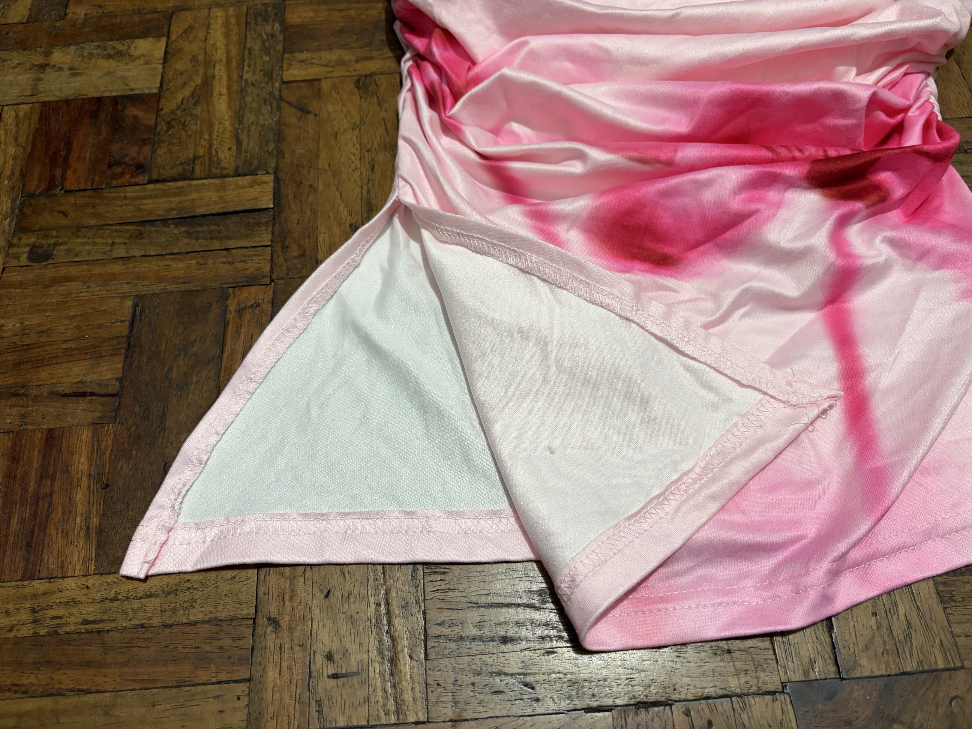 pink tube top (Category: Sleeveless) located in Las Pinas. Submitted by nylth (Listing ID 1417549571, Image 3). Description: asymmetrical tube top with slit on one side.