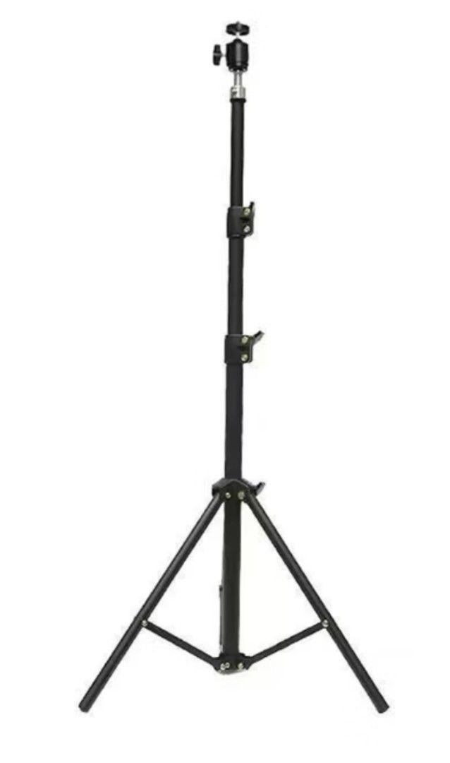Projector Stand (Category: Other Home Appliances) located in Singapore. Submitted by vongoh (Listing ID 1417543174, Image 1). Description: Sturdy black tripod stand, perfect for photography or videography. Great for supporting cameras, lights, or other equipment. Easy to set up and use..