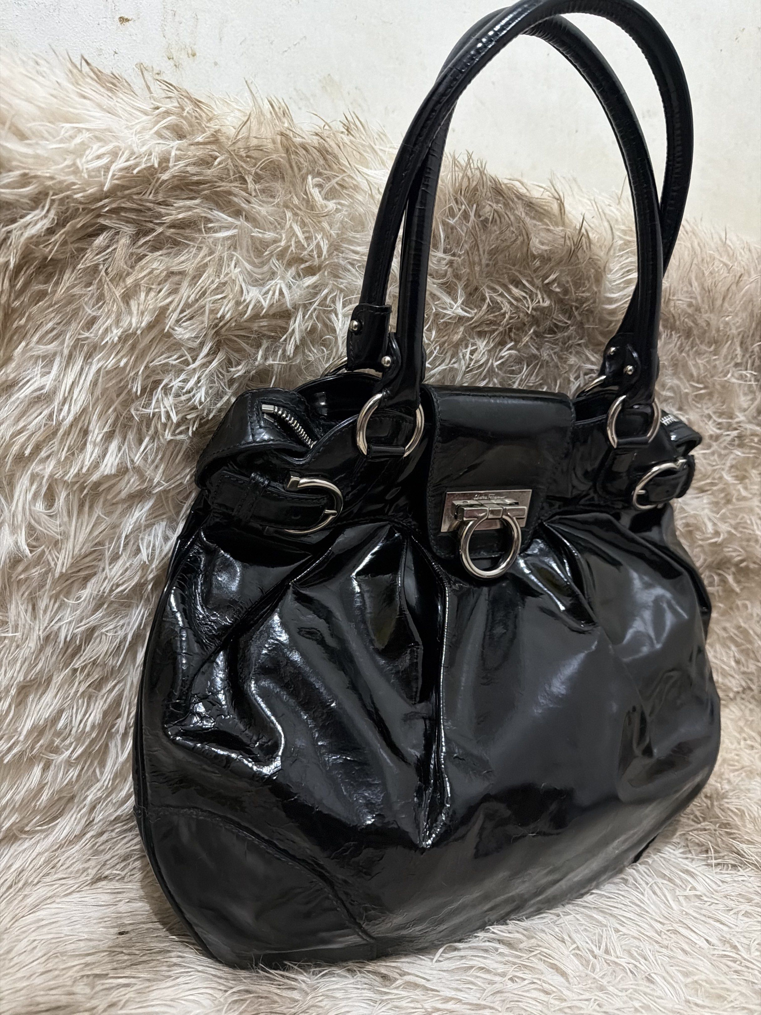 Salvatore Ferragamo Black Hobo Bag (Category: Luxury Bags & Wallets) located in Puerto Princesa. Submitted by betz0921 (Listing ID 1417563314, Image 3). Description: Very Minimal Signs of use Soft patent leather 100% Authentic Large size .