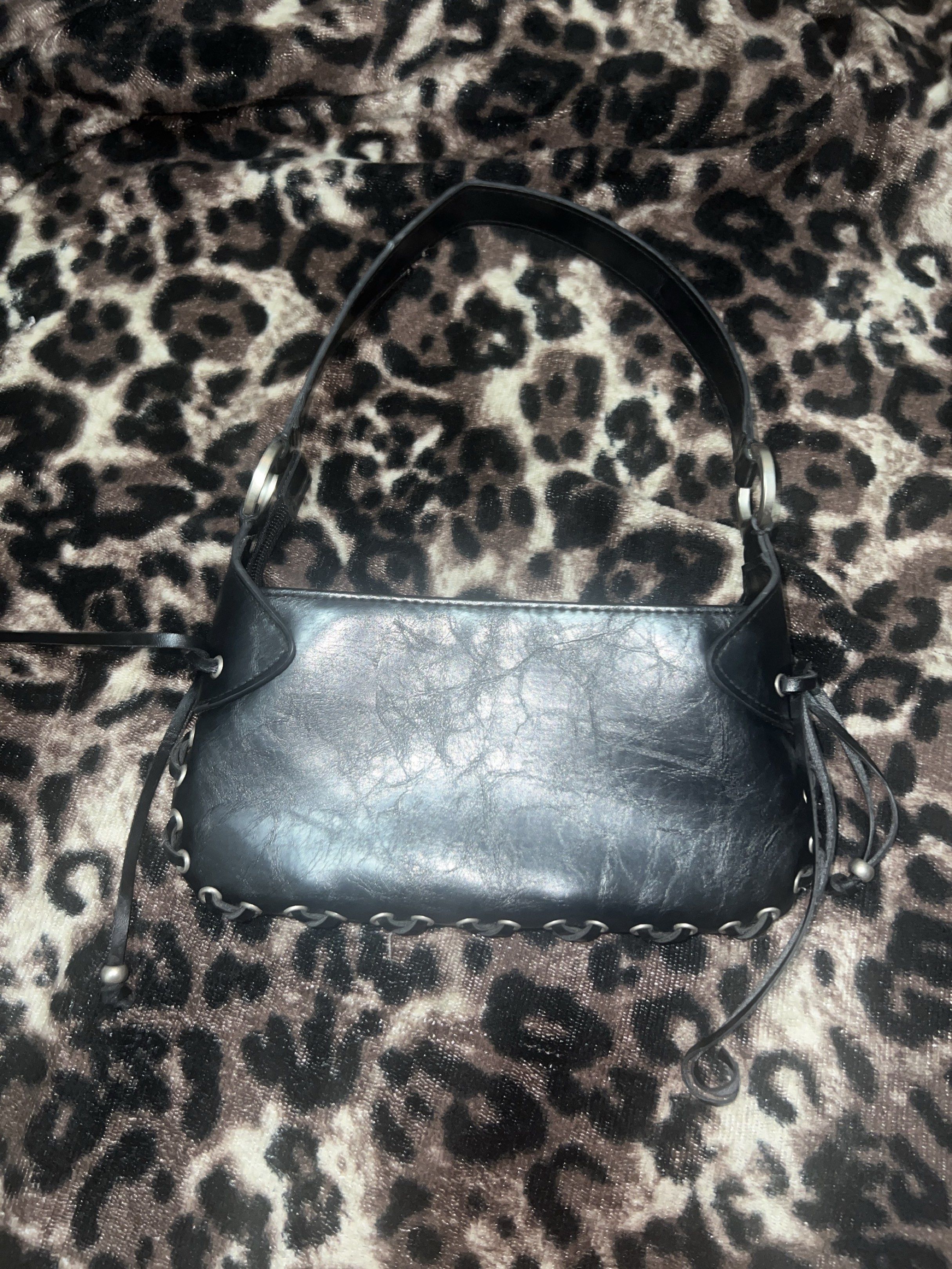 Small Mini y2k Bag with cute string design and silver buckles (Category: Shoulder Bags) located in Manila. Submitted by kb-0921 (Listing ID 1417473177, Image 2). Description: > Very mini could probably fit like a wallet and phone > Leather > rfs: I dont use it.