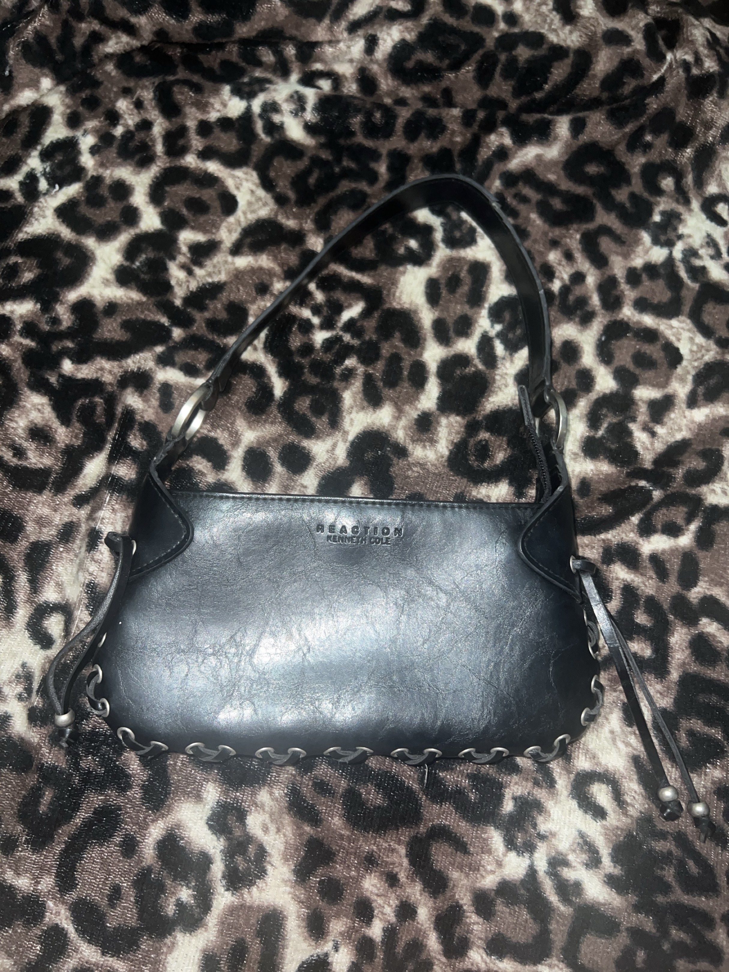 Small Mini y2k Bag with cute string design and silver buckles (Category: Shoulder Bags) located in Manila. Submitted by kb-0921 (Listing ID 1417473177, Image 1). Description: > Very mini could probably fit like a wallet and phone > Leather > rfs: I dont use it.