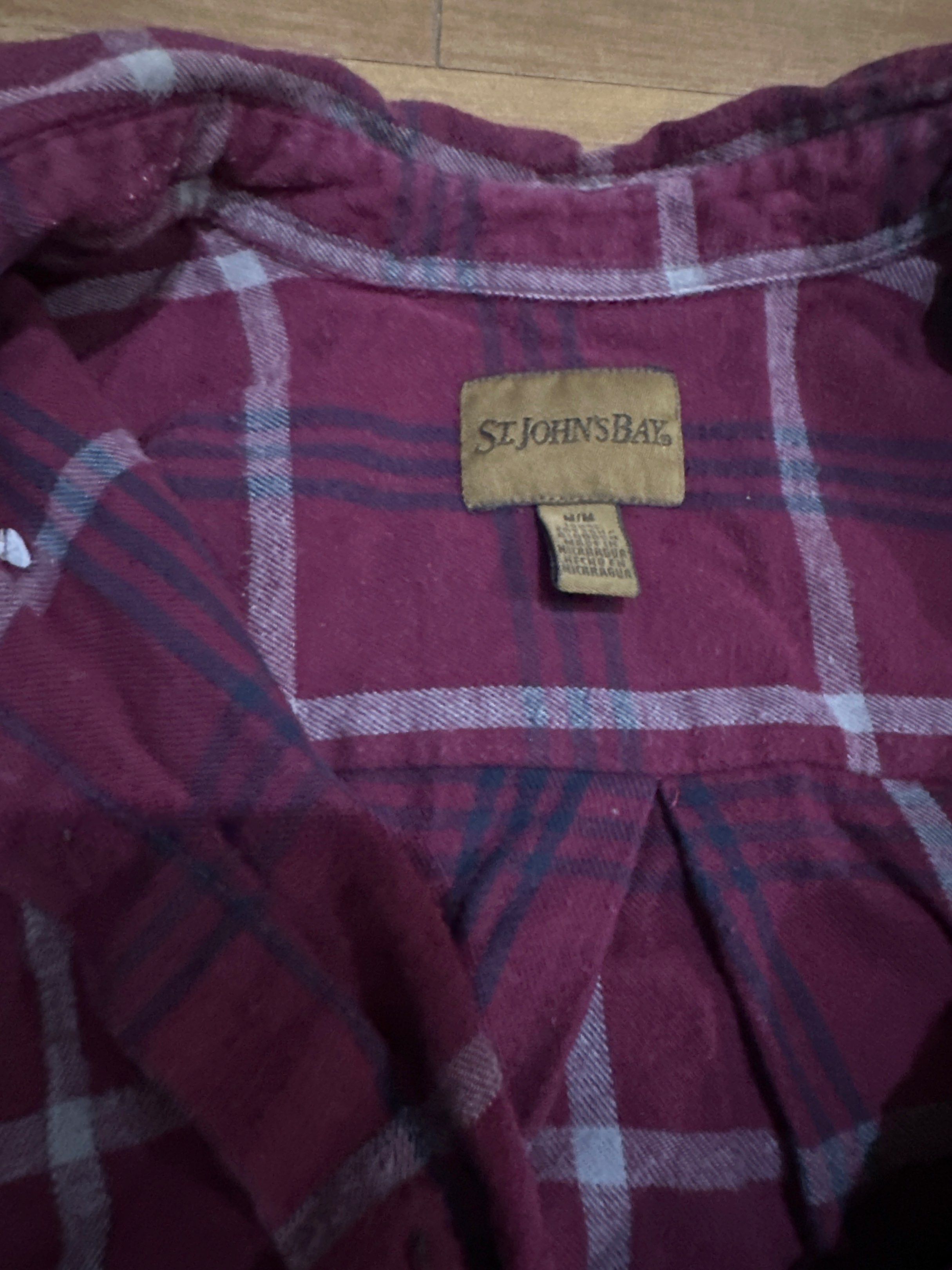 St. John's Bay Plaid Flannel Shirt (Category: Tshirts & Polo Shirts ) located in Pasig City. Submitted by jhadsan (Listing ID 1417471603, Image 2). Description: - St. John's Bay Flannel Shirt - Size: M/M - Color: Burgundy, Gray, and Navy Plaid - Features: Button-down front, long sleeves with buttoned cuffs, collared neckline, and chest pocket..