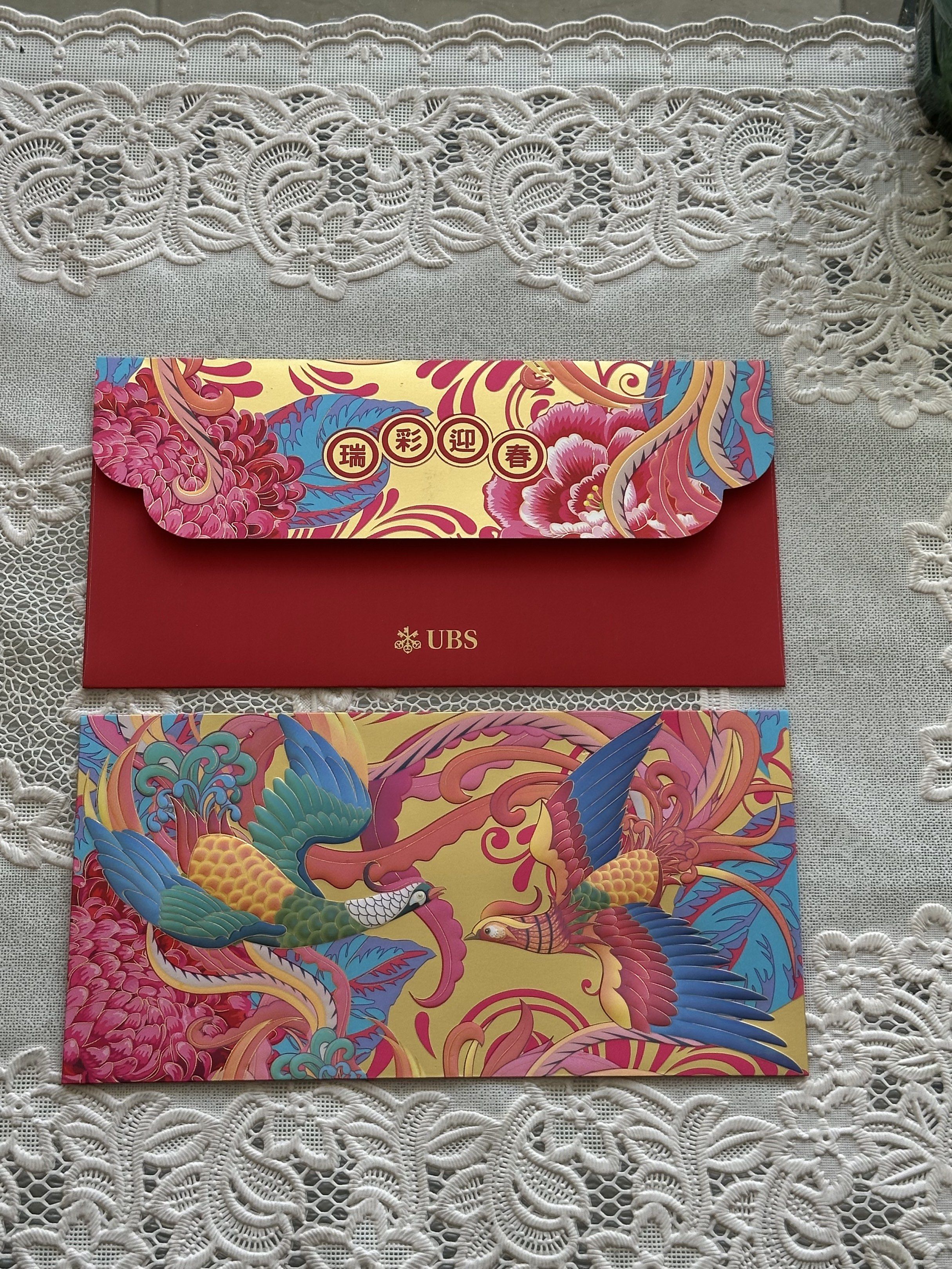 UBS Red Packets (Category: Other Stationery & Craft) located in Singapore. Submitted by chloemee (Listing ID 1417543808, Image 2). Description: Very pretty UBS phoenix red packets. 1 set available 8 pieces in a set (4 red 4 gold) $6 Inclusive of normal mail Ang pao/ang bao/red packets 🍊🧧 Red packet for Chinese New Year 2026.