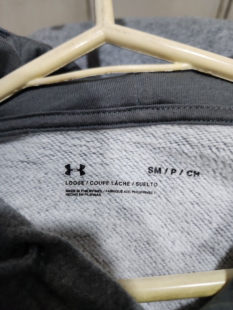 Under Armour Hoodie - Gray - SM (Category: Hoodies) located in Manila. Submitted by juneuy (Listing ID 1417509398, Image 2). Description: - Under Armour hoodie - Size: SM - Color: Gray - Features: Hood and front pocket - Made in the Philippines - Loose fit - Under Armour logo on chest.