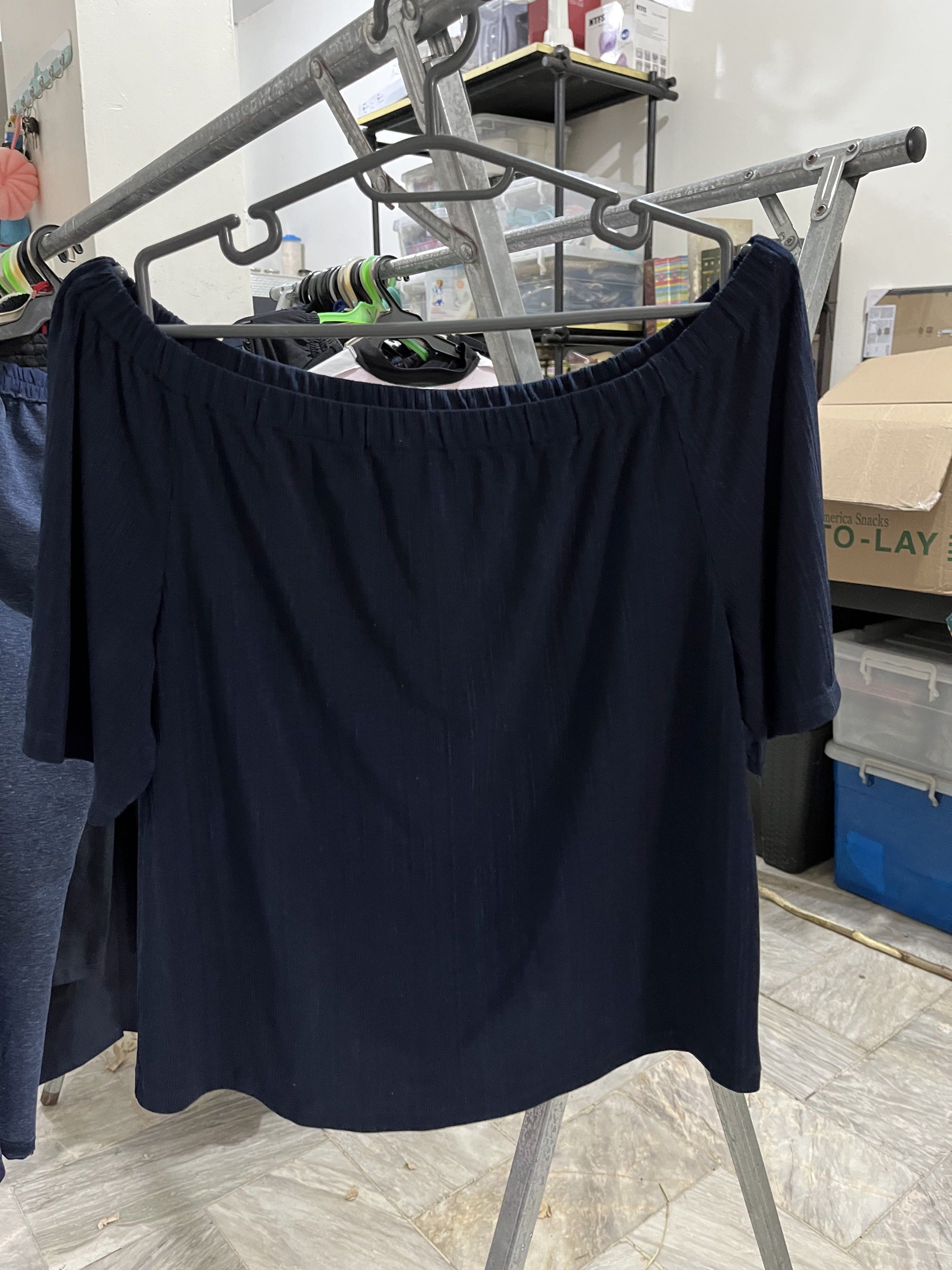 Uniqlo Off-Shoulder Top - Size S (Category: Blouses) located in Marikina City. Submitted by hello-yellow (Listing ID 1417489787, Image 1). Description: - Uniqlo navy blue off-shoulder top - Size: S on-tag. Fit Small to Semi Large. - Stretchable - Elastic neckline - Made in Indonesia - Subtle textured fabric - Versatile wardrobe staple.
