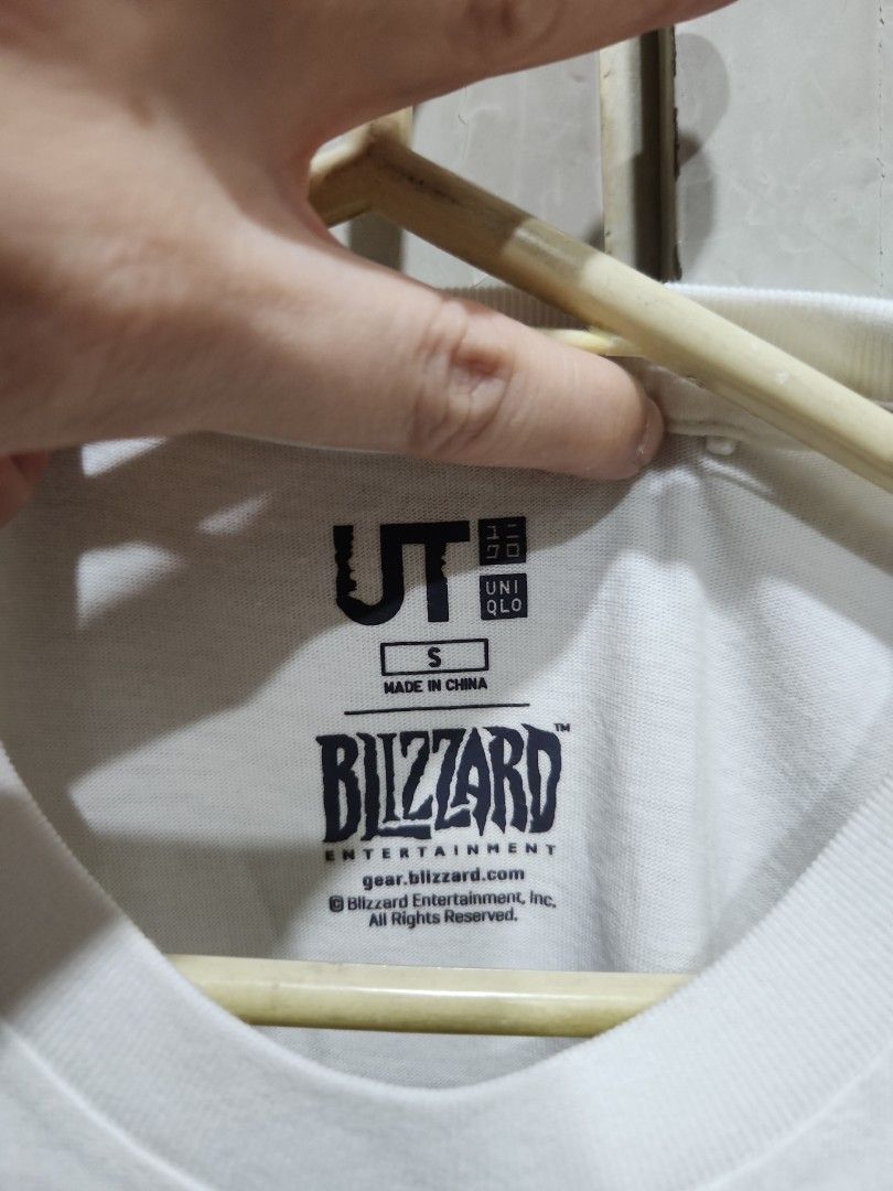 Uniqlo UT Blizzard Graphic Tee - Size S (Category: Tshirts & Polo Shirts ) located in Manila. Submitted by juneuy (Listing ID 1417508858, Image 2). Description: - Uniqlo UT t-shirt - Blizzard graphic - Size: S - Crew neck - Short sleeves - Made in China - Graphic color: Gold and black - Back of shirt: Plain white.