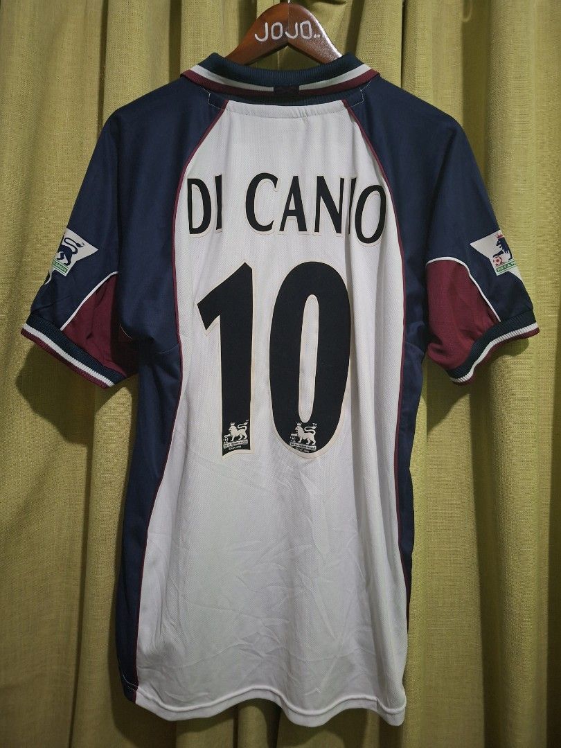 West Ham United Di Canio Jersey (Category: Activewear) located in Paranaque City. Submitted by stufflykdat (Listing ID 1417405750, Image 2). Description: - West Ham United jersey - Features Di Canio #10 - White front with navy and maroon design - Includes Dr. Martens and Fila logos - West Ham United crest present.