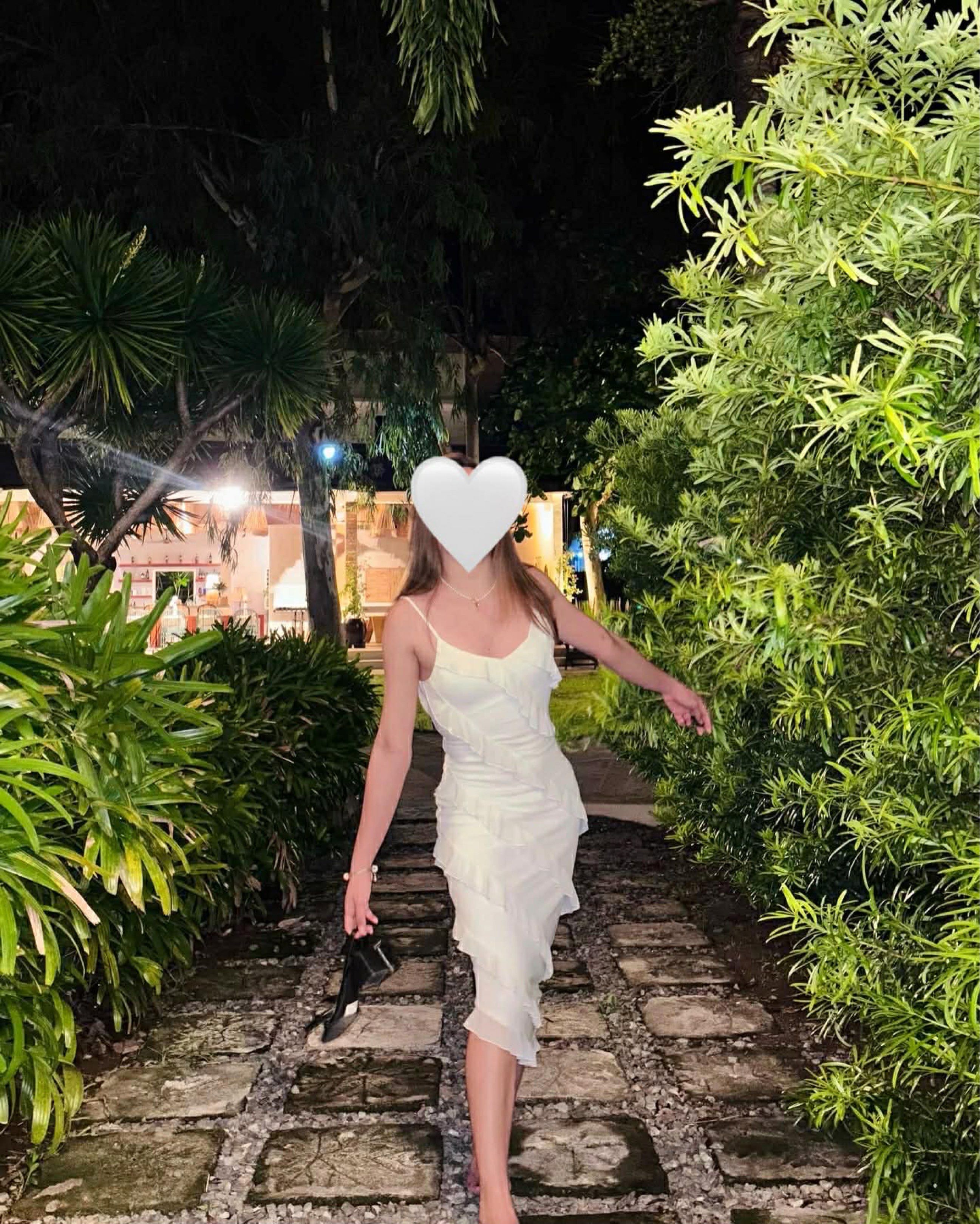 White Ruffled Midi Dress (Category: Dresses) located in Meycauayan. Submitted by declutter0403 (Listing ID 1417481270, Image 2). Description: - Elegant white midi dress - Spaghetti straps - Ruffled design - Fitted bodice - Versatile for various occasions.