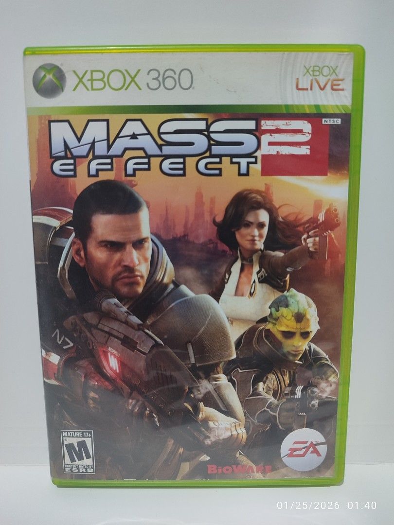 XBOX 360 - Mass Effect 2 (PRE-OWNED) "OPEN REGION" (Category: Xbox) located in Mendez-Nunez. Submitted by sf2_gameshop (Listing ID 1417491861, Image 1). Description: PLEASE READ Open region, the disc will work on any Xbox 360 unit regardless of region. PAL - √ (Yes) NTSC/J - √ (Yes) NTSC - √ (Yes) CONDITION: Pre-owned item.Tested working. Both discs are in good condition. It comes with a game manual and inserts. GENRE: Action role-playing, third 