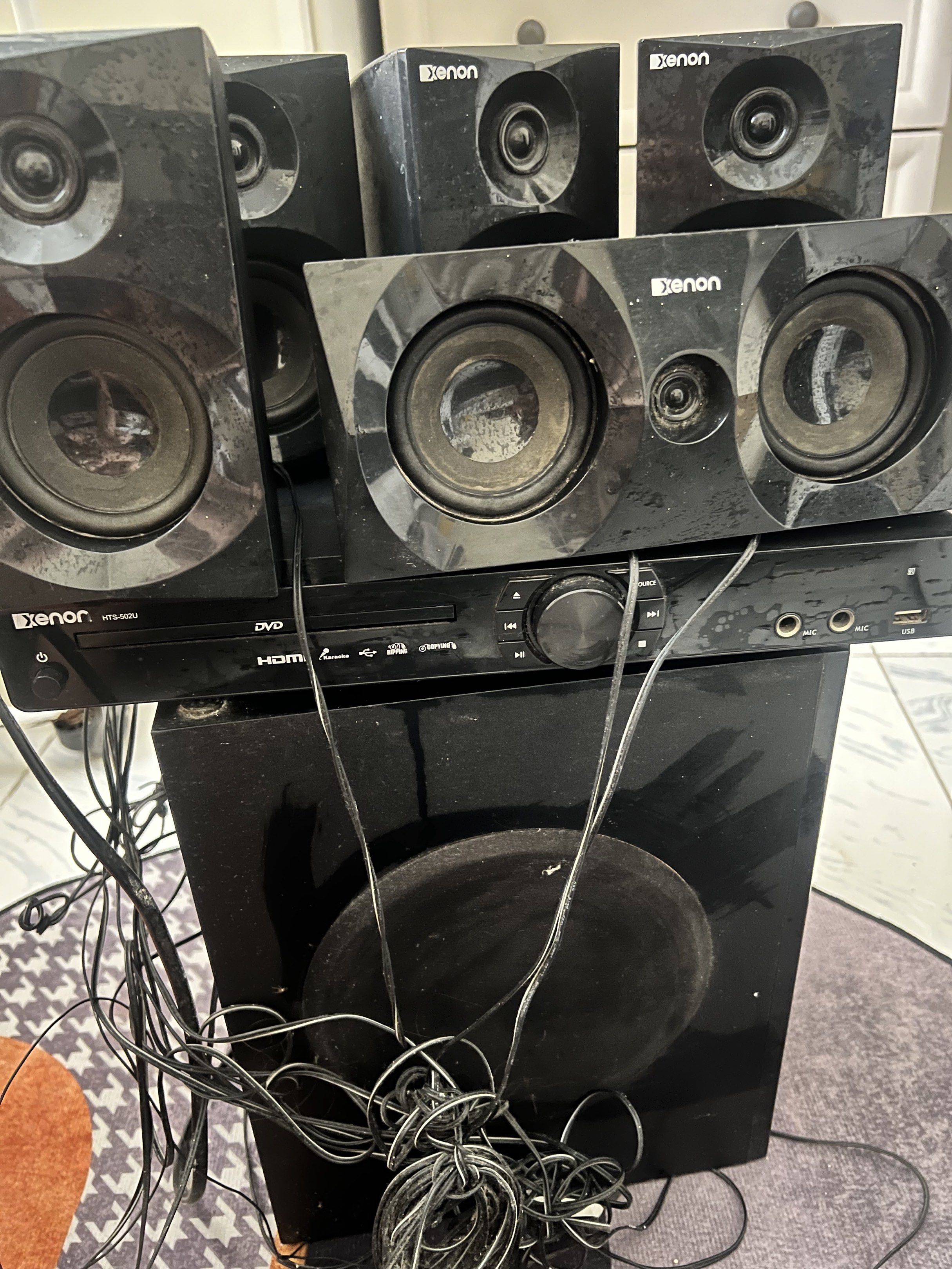 Xenon Home Theater System (Category: Soundbars, Speakers & Amplifiers) located in Caloocan City. Submitted by kcconstntino (Listing ID 1417516577, Image 1). Description: - Xenon home theater system - Includes DVD player, subwoofer, and speakers - HDMI connectivity - All components are black - Includes all necessary wires - Ready for home entertainment.