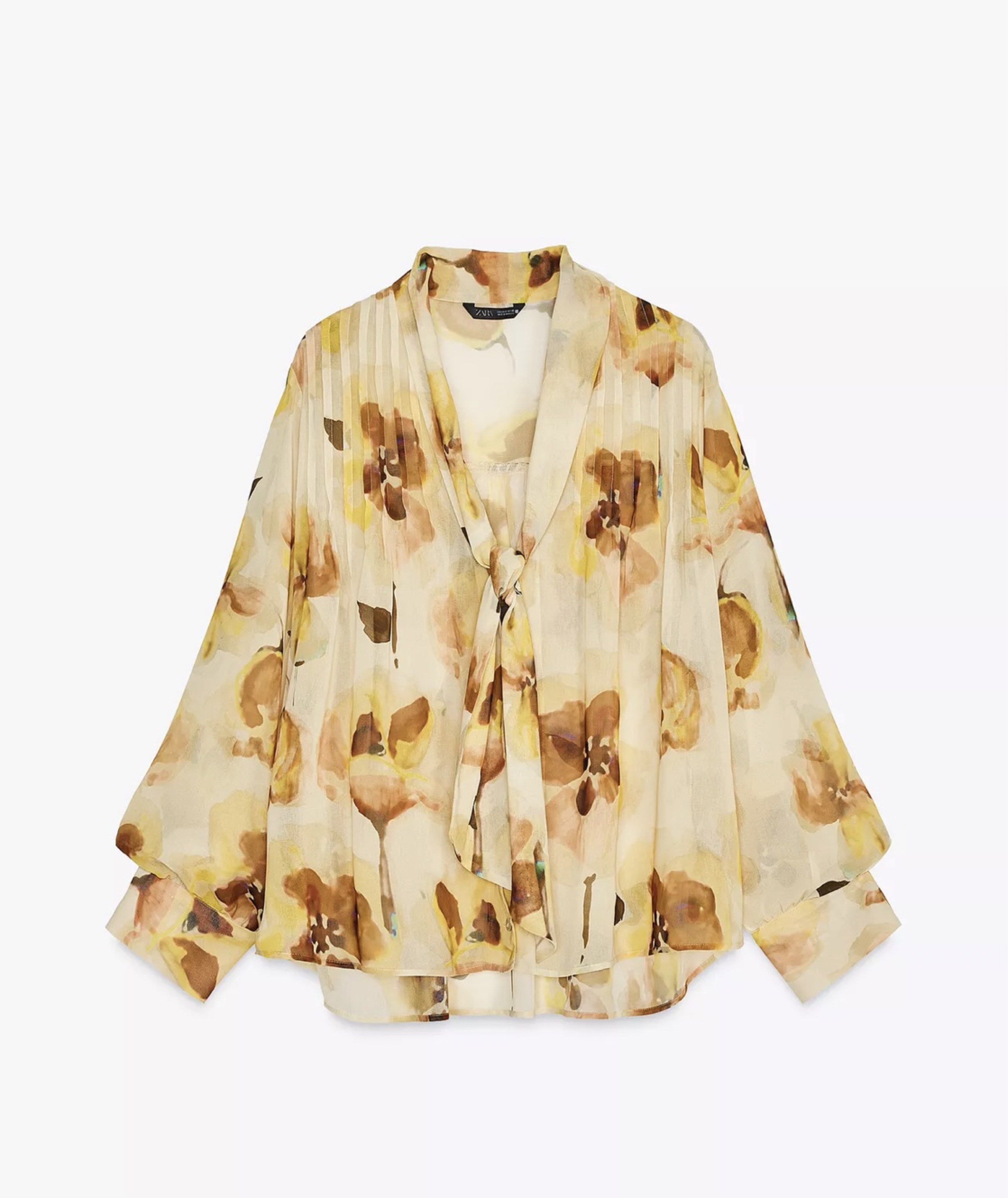 Zara Floral Print Blouse (Category: Blouses) located in Davao. Submitted by prettybuys.ph (Listing ID 1417578822, Image 1). Description: Barely Used. In good condition. RFS: Decluttering Message me for actual photo/video of the item - Zara floral print blouse - Features a tie-neck detail - Long sleeves - Flowy silhouette - Suitable for skirts and pants - Chic and stylish.
