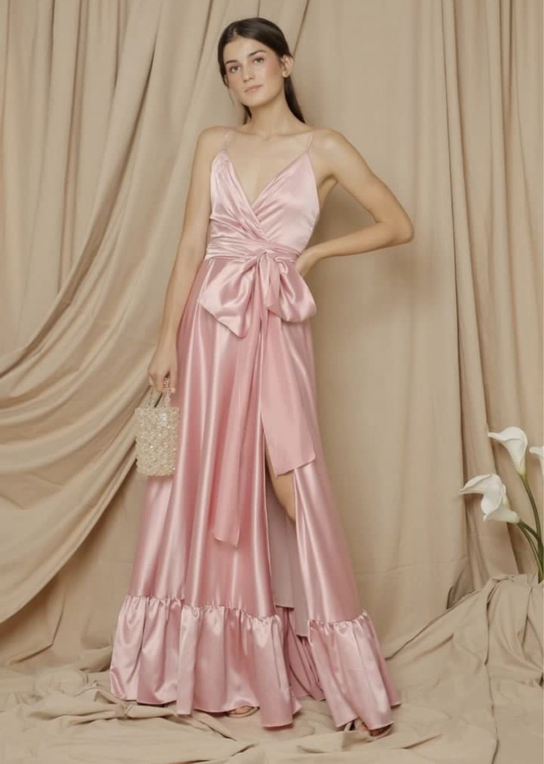 ZOO Label Magarita Deep V Maxi Pink (Category: Dresses) located in Mandaluyong City. Submitted by andi1023 (Listing ID 1417407159, Image 2). Description: - ZOO pink maxi dress - Size: S - Features: - V-neck - Spaghetti straps - Bow detail at waist - High slit - Ruffled hem - Ideal for special occasions Never worn.
