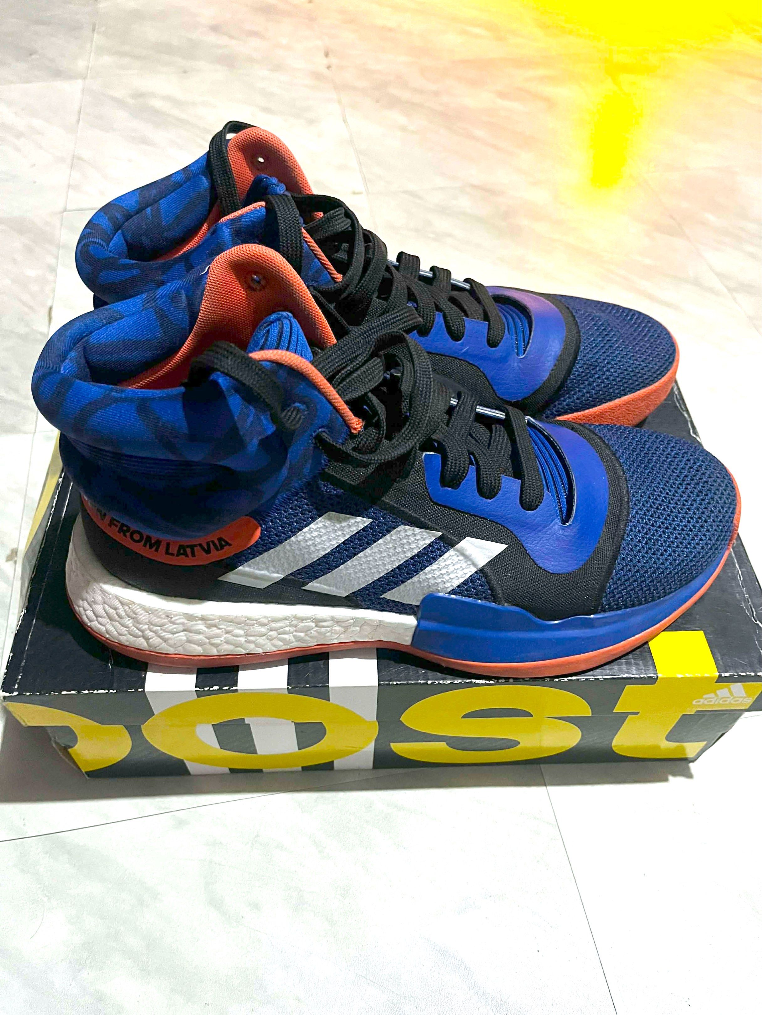 Adidas Marquee Boost Basketball Shoes (Category: Sneakers) located in Cabanatuan. Submitted by bag_a_beau (Listing ID 1417642399, Image 3). Description: - Adidas Marquee Boost basketball shoes - Color: Blue and orange with white stripes - High-top design - Boost midsole technology - Size: US 9.5, UK 9, FR 43 1/3, JP 275, CHN 265 - Includes original box - Lightly used, outer sole needs cleaning but overall this item is in excellent condition. This