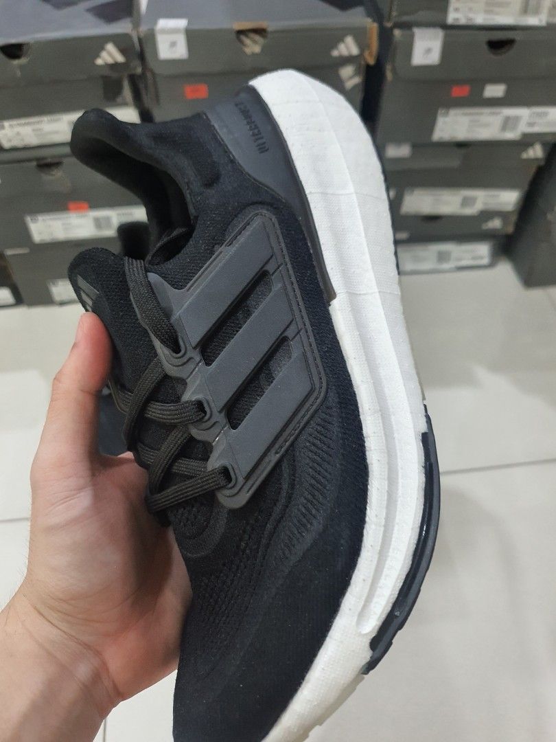 Adidas Ultraboost Light Black/White (Oreo) (Category: Sneakers) located in Manila. Submitted by deancchiu (Listing ID 1417645947, Image 2). Description: - Adidas Ultraboost Light - Size: 5 to 7.5 US Mens - Price starts at 2,500 - Color: Black upper - Iconic three stripes design - White sole with black accents - Includes original box - Brand new with tag.