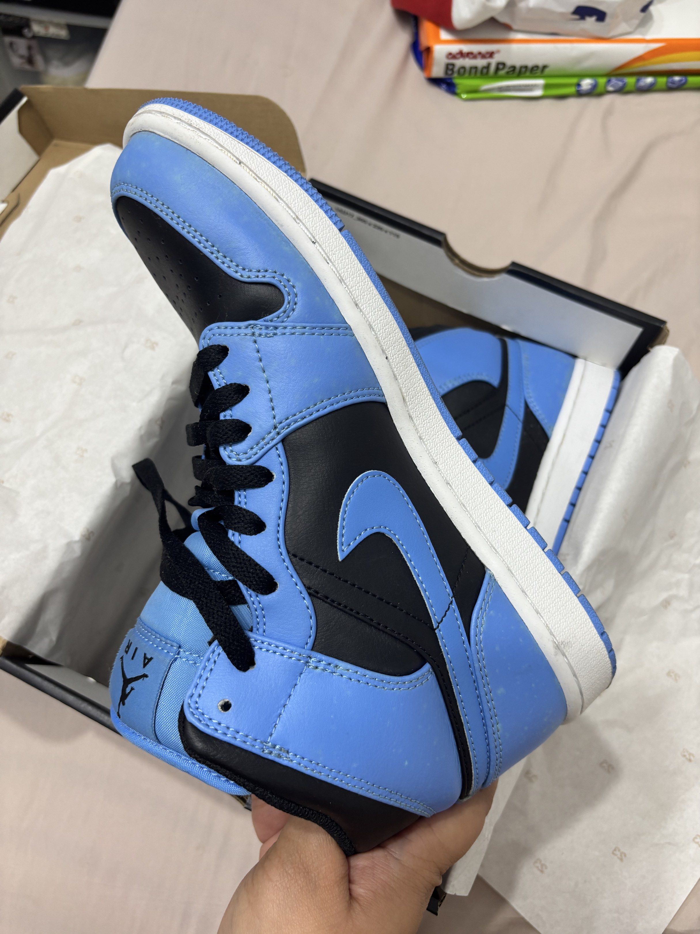 Air Jordan 1 Mid University Blue (Category: Sneakers) located in San Fernando. Submitted by mhedkm (Listing ID 1417766005, Image 3). Description: - Air Jordan 1 Mid - Colorway: University Blue and Black - Size: US 8.5, UK 7.5, EUR 42, CM 26.5 - Style Code: DQ8426 401 - Includes original box with gold Jumpman logo.
