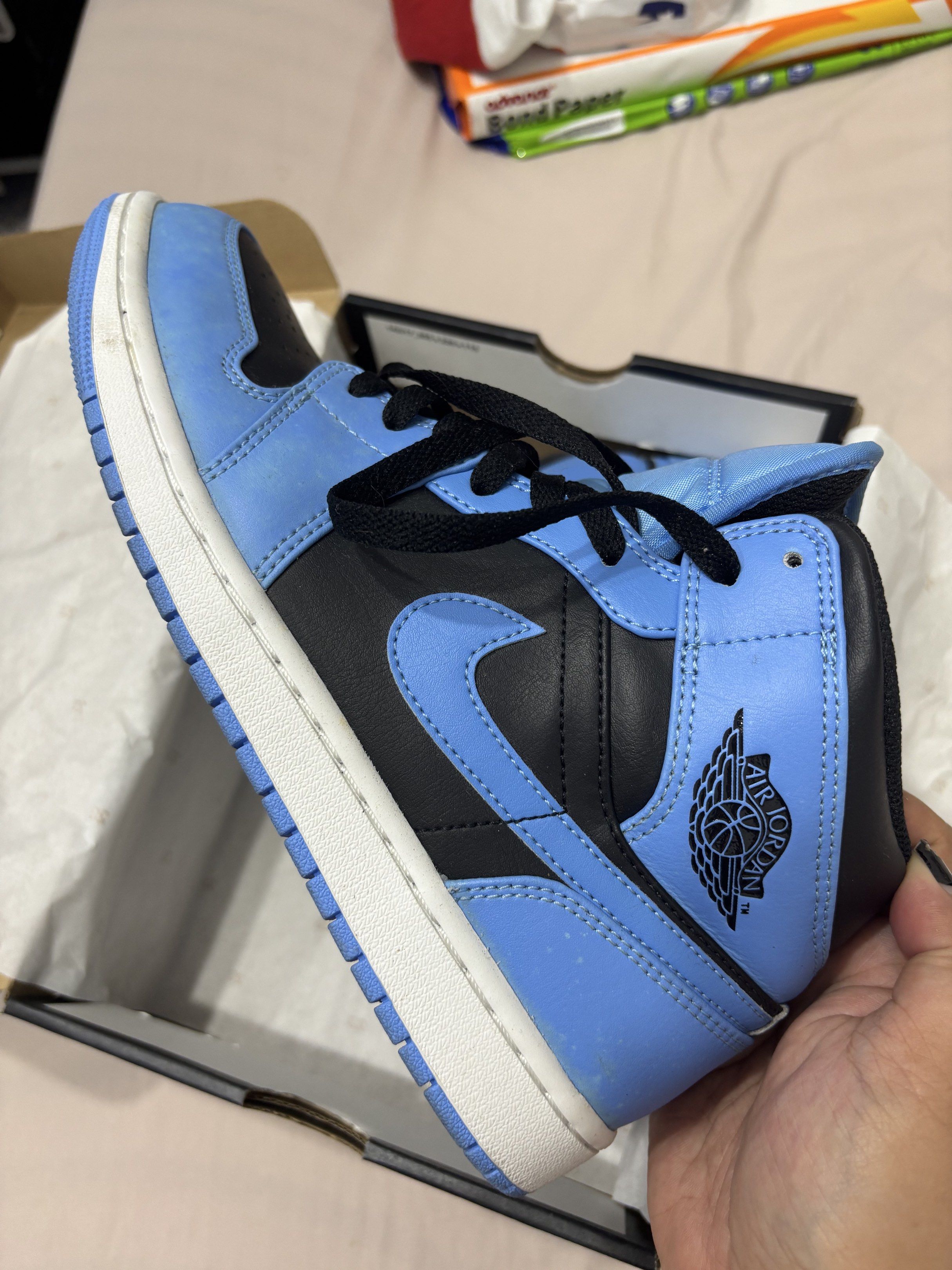 Air Jordan 1 Mid University Blue (Category: Sneakers) located in San Fernando. Submitted by mhedkm (Listing ID 1417766005, Image 2). Description: - Air Jordan 1 Mid - Colorway: University Blue and Black - Size: US 8.5, UK 7.5, EUR 42, CM 26.5 - Style Code: DQ8426 401 - Includes original box with gold Jumpman logo.