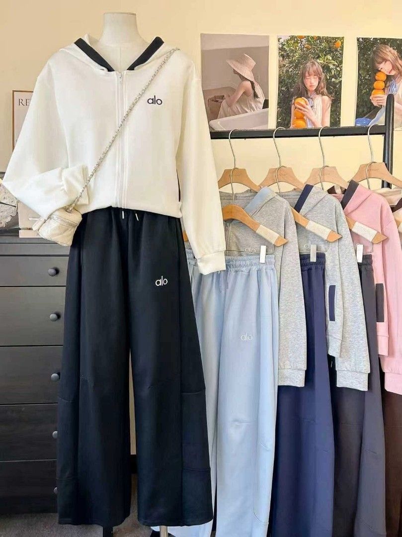 Alo Sweat Suit Set (Category: Activewear) located in Manila. Submitted by raredeer-4deb4e (Listing ID 1417619808, Image 2). Description: - Alo sweat suit set - Includes zip-up hoodie and wide-leg pants - Hoodie features: drawstring hood, Alo logo on chest - Pants feature: drawstring waist, Alo logo on leg - Comfortable for everyday wear - Available in multiple colors - Stylish and versatile.