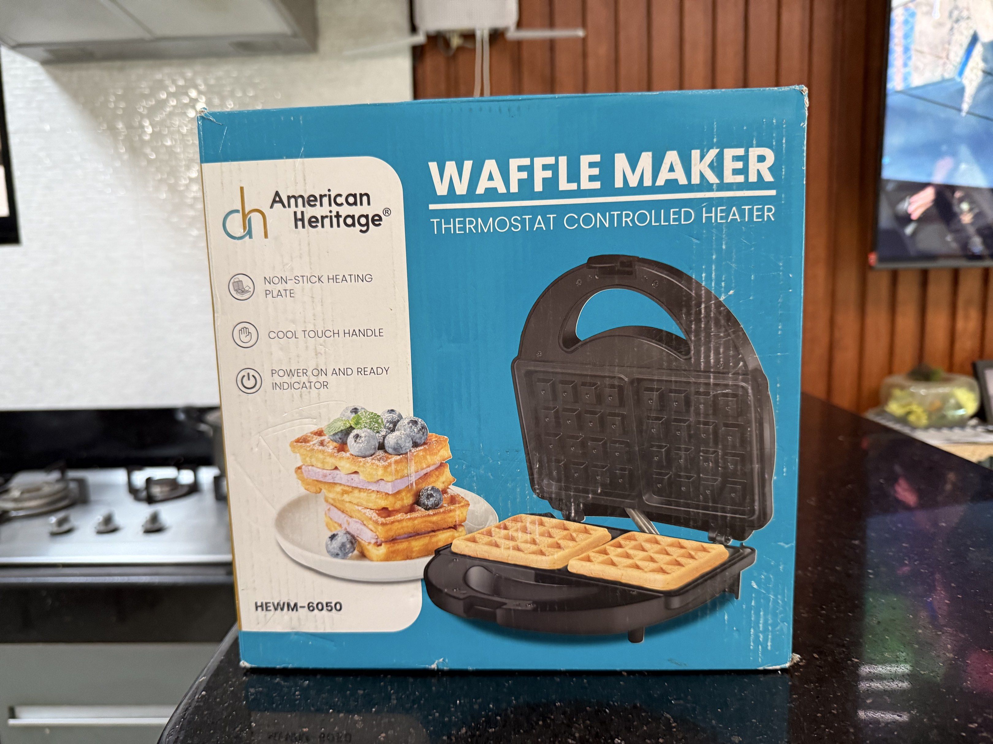 American Heritage Waffle Maker HEWM-6050 (Category: Other Kitchen Appliances) located in Bacoor. Submitted by yoonkibox (Listing ID 1417755227, Image 1). Description: BRAND NEW. NEVER BEEN USED. - American Heritage waffle maker for perfect waffles. - Non-stick heating plate for easy cleaning. - Cool-touch handle for safety. - Power-on/ready indicator. - Thermostat control for consistent results. - Model: HEWM-6050..