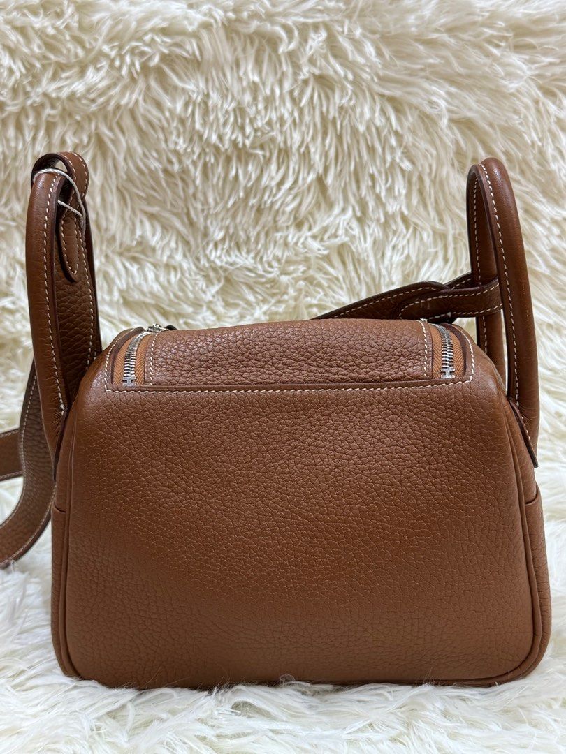 Authentic Hermes (Category: Luxury Accessories) located in Manila. Submitted by chloe_luxuries (Listing ID 1417651841, Image 2). Description: Guaranteed Original Hermes Mini Lindy Gold hardware clemence leather Still in very good condition Comes with dustbag Pm for those interested.