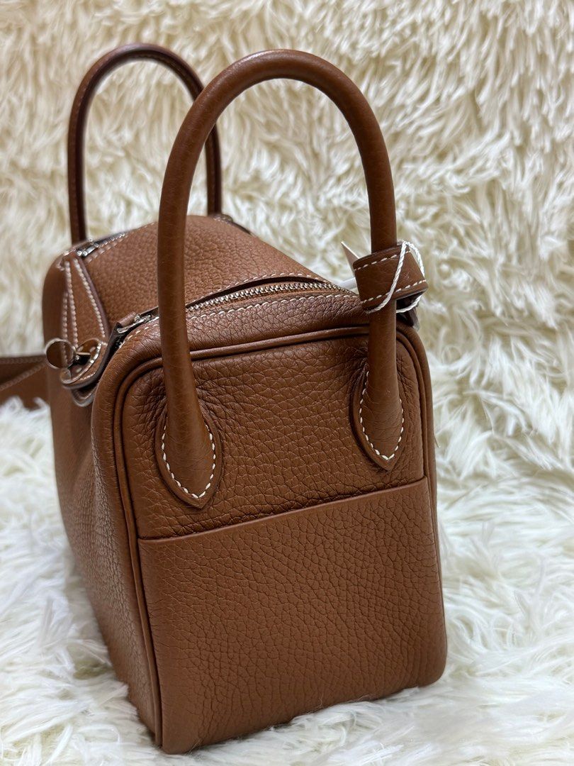 Authentic Hermes (Category: Luxury Accessories) located in Manila. Submitted by chloe_luxuries (Listing ID 1417651841, Image 3). Description: Guaranteed Original Hermes Mini Lindy Gold hardware clemence leather Still in very good condition Comes with dustbag Pm for those interested.
