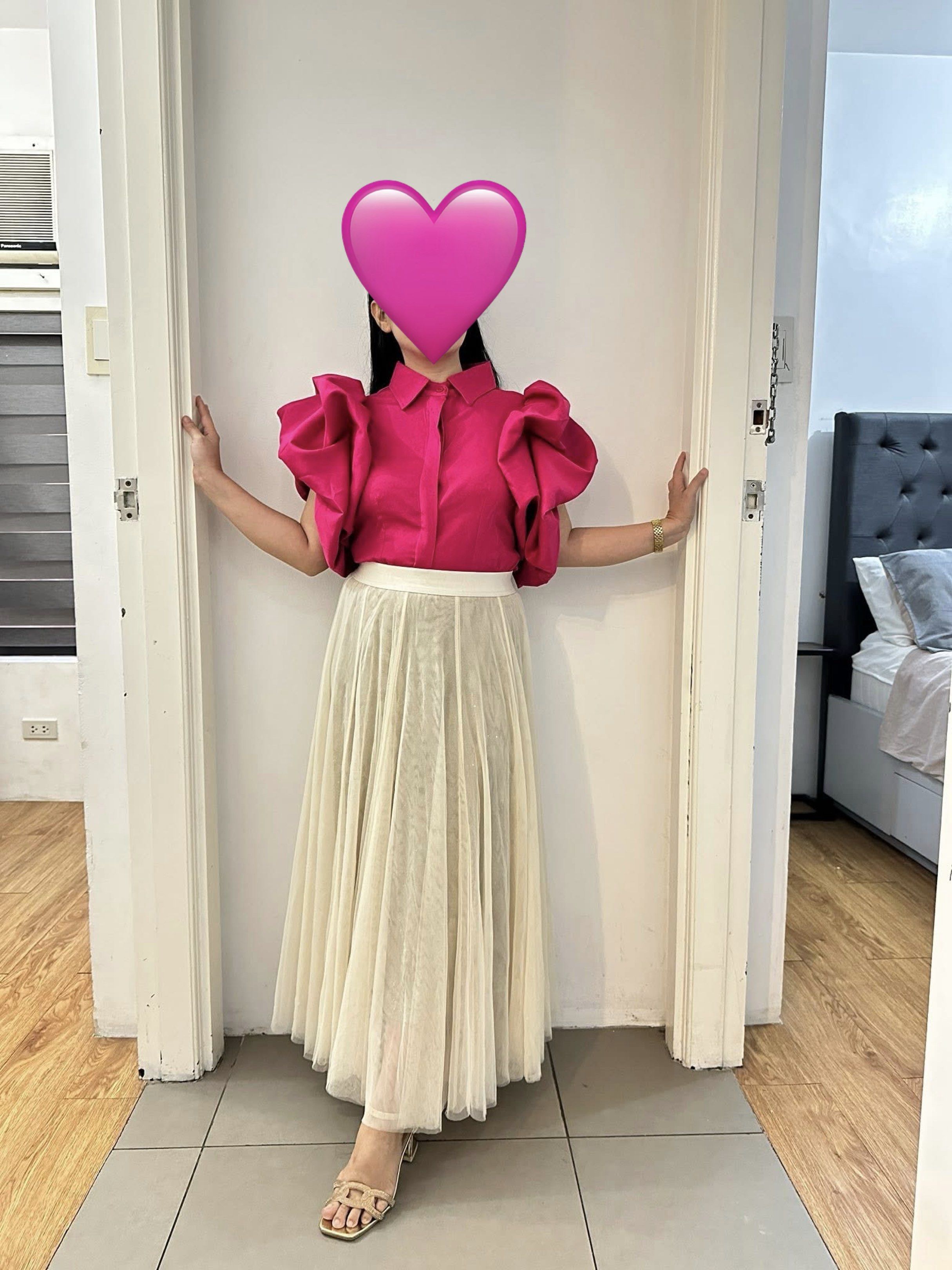 Avekoria Pink Puff Sleeve Blouse (Category: Blouses) located in Quezon City. Submitted by jcmelbs (Listing ID 1417710292, Image 3). Description: - Avekoria pink blouse - Features a classic collar and button-down front - Eye-catching puff sleeves - Vibrant pink color - Size indicated on label.