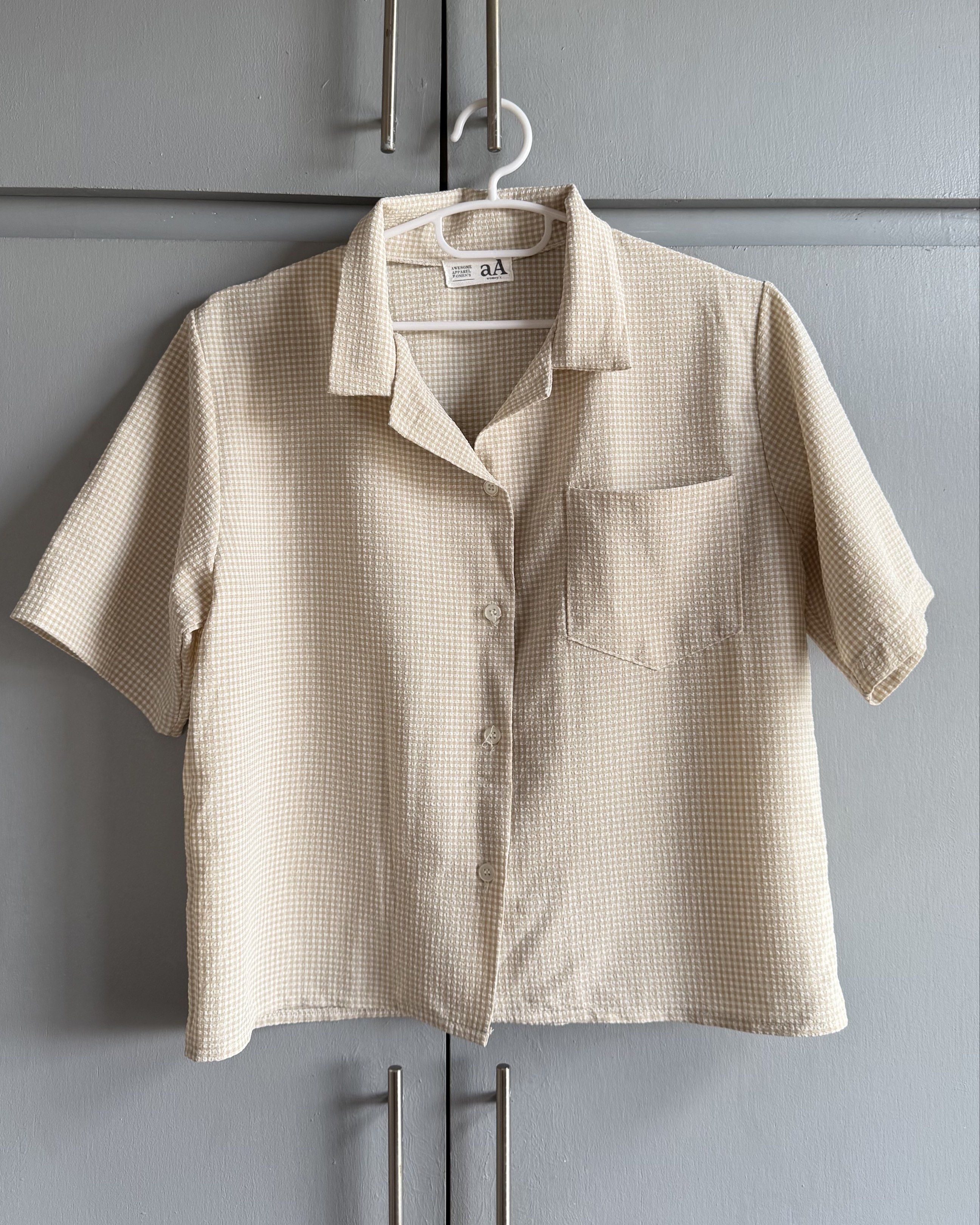 Beige Gingham Boxy Polo Shirt/Top (Category: Others Tops) located in San Juan City. Submitted by itemsfromkam (Listing ID 1417749156, Image 1). Description: • fits up to S • textured fabric, a bit stretchable, slightly boxy fit.