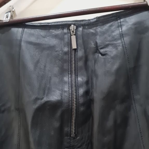 Black Leather Skirt (Category: Skirts) located in Marikina City. Submitted by repurpose_studio (Listing ID 1417654390, Image 3). Description: - Black leather skirt - Features vertical seams - Suitable for various occasions Notes: - Colors may appear different due to lighting and photo conditions - No returns, exchanges and refunds #blackskirt #leatherskirt #midskirt #prelovedph #ukayph #thriftph #womenswear #casualwear #repurposestudio #ukayfind 