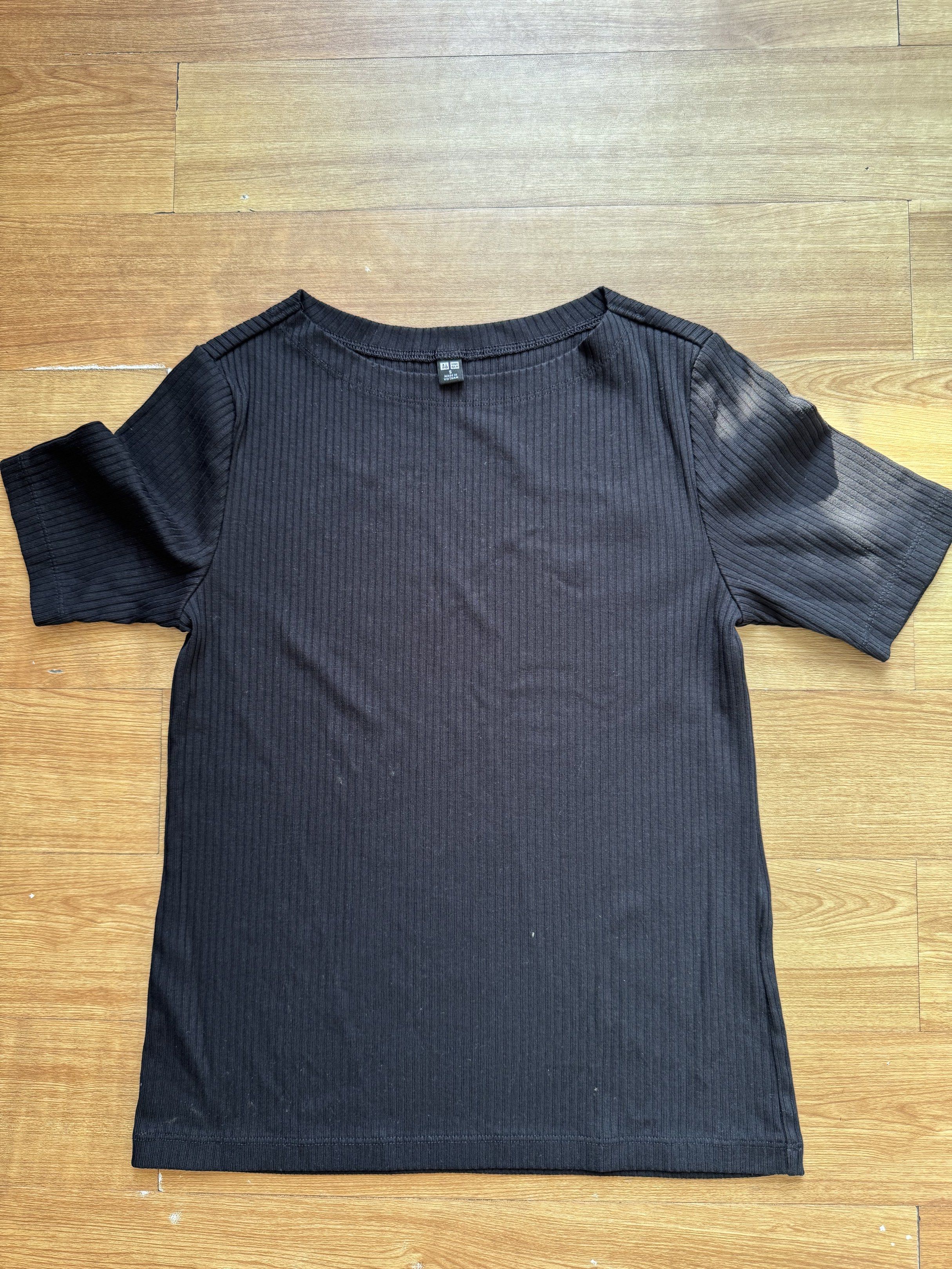 Black Ribbed Short Sleeve Top (Category: Shirts) located in Manila. Submitted by obach (Listing ID 1417733699, Image 1). Description: - Black ribbed top - Short sleeves - Round neckline (front), slightly curved back - Medium weight fabric - Includes brand tag.