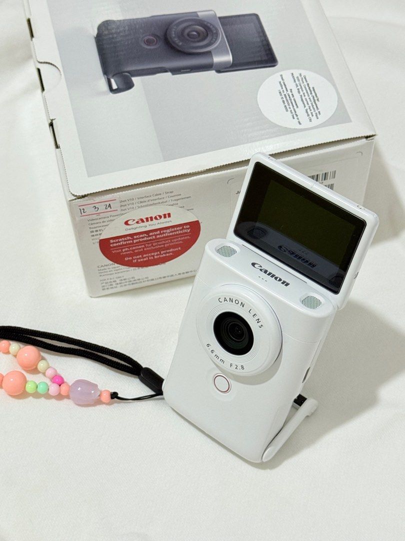Canon PowerShot V10 Digital/Vlogging Camera White (Category: Cameras) located in Las Pinas. Submitted by taehyungiebr (Listing ID 1395674255, Image 1). Description: - Canon PowerShot V10 Digital Camera (bought last jan 2025) - purchased at the Canon store in SM Mall of Asia (receipt still available) - good condition - message for more sample vids/pics (sample shots are in the last photo) - super cute for vlogging🥰 - 4K UHD 30p Video Recording - 