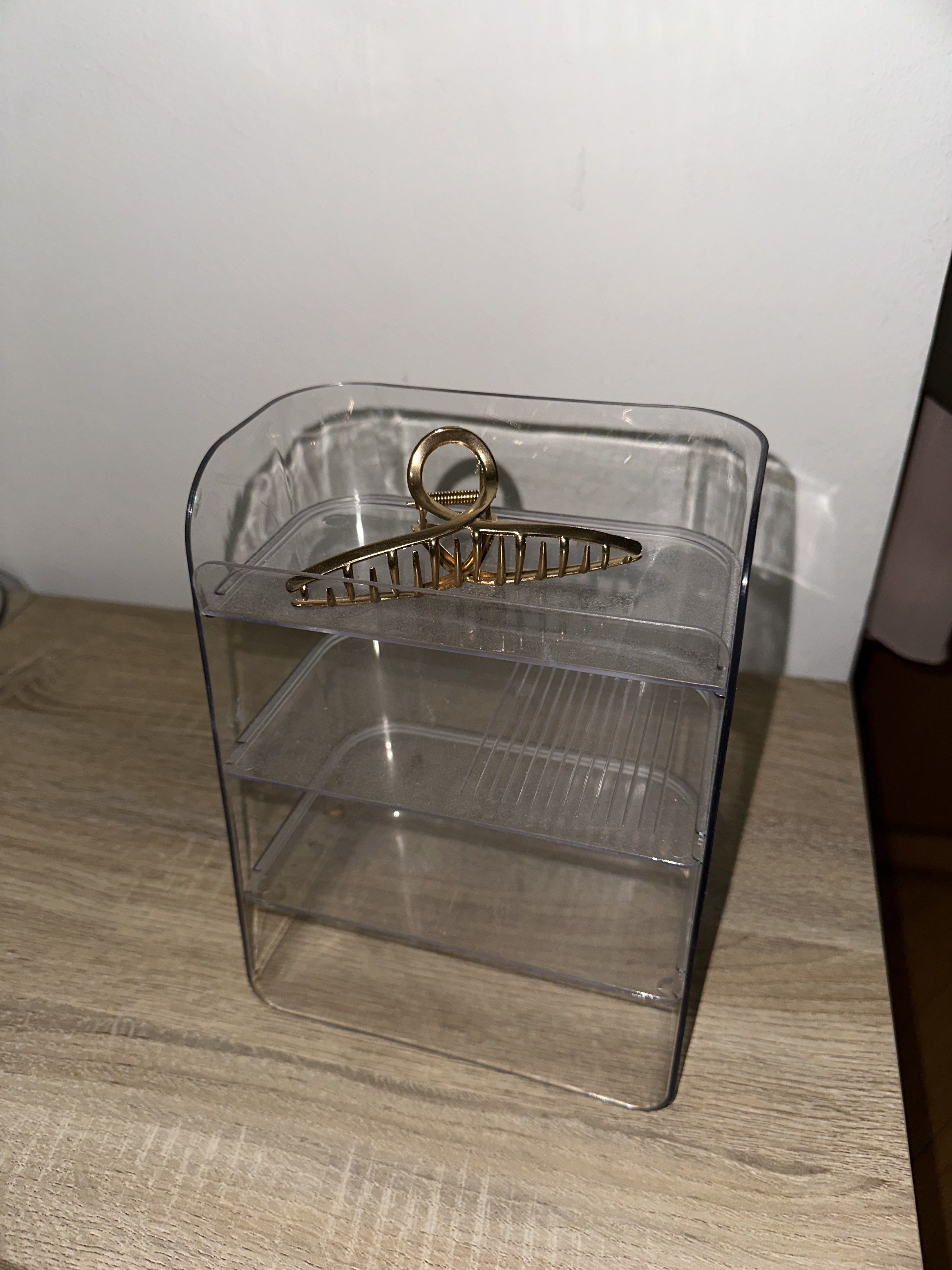 Clear Acrylic Makeup Organizer (Category: Makeup) located in Quezon City. Submitted by ina517 (Listing ID 1417748337, Image 1). Description: - Clear acrylic makeup organizer - Tiered design for easy organization - Multiple compartments for storage - Perfect for makeup, skincare, and small items - Keeps essentials neatly arranged - Great for vanity or bathroom countertop.