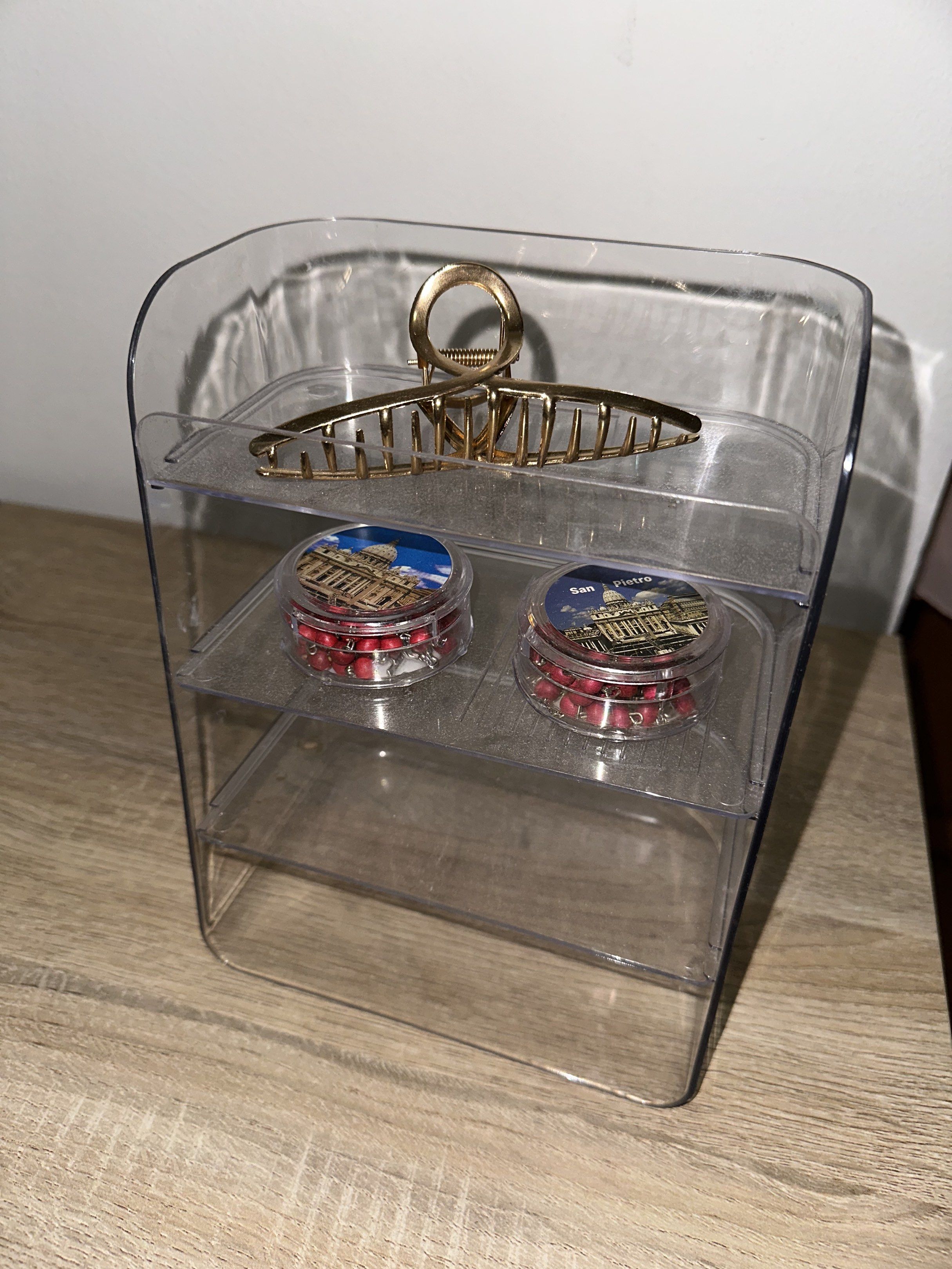 Clear Acrylic Makeup Organizer (Category: Makeup) located in Quezon City. Submitted by ina517 (Listing ID 1417748337, Image 3). Description: - Clear acrylic makeup organizer - Tiered design for easy organization - Multiple compartments for storage - Perfect for makeup, skincare, and small items - Keeps essentials neatly arranged - Great for vanity or bathroom countertop.